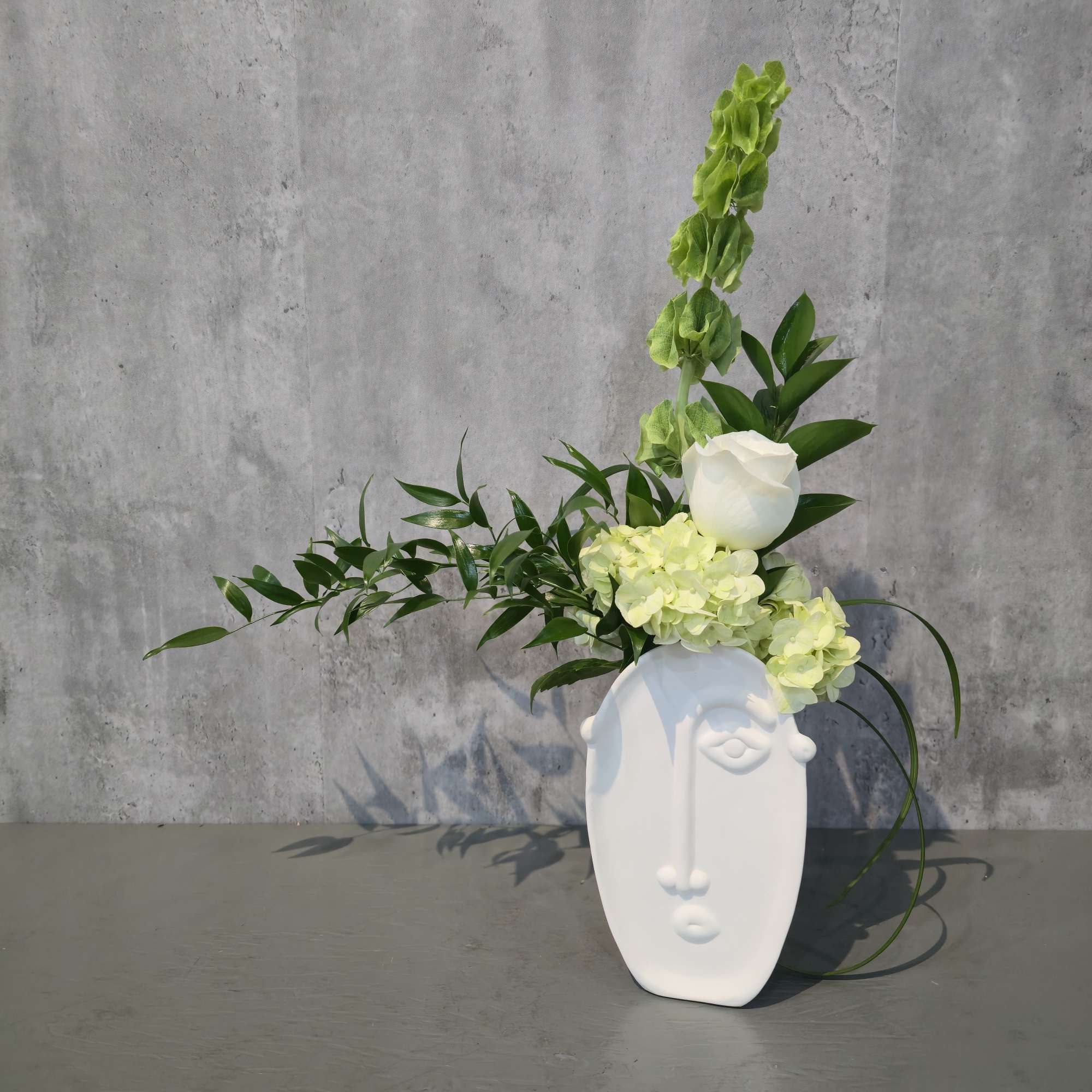 Elegant simplicity meets artistic flair in our &quot;Amelia&quot; Arrangement. This design features
