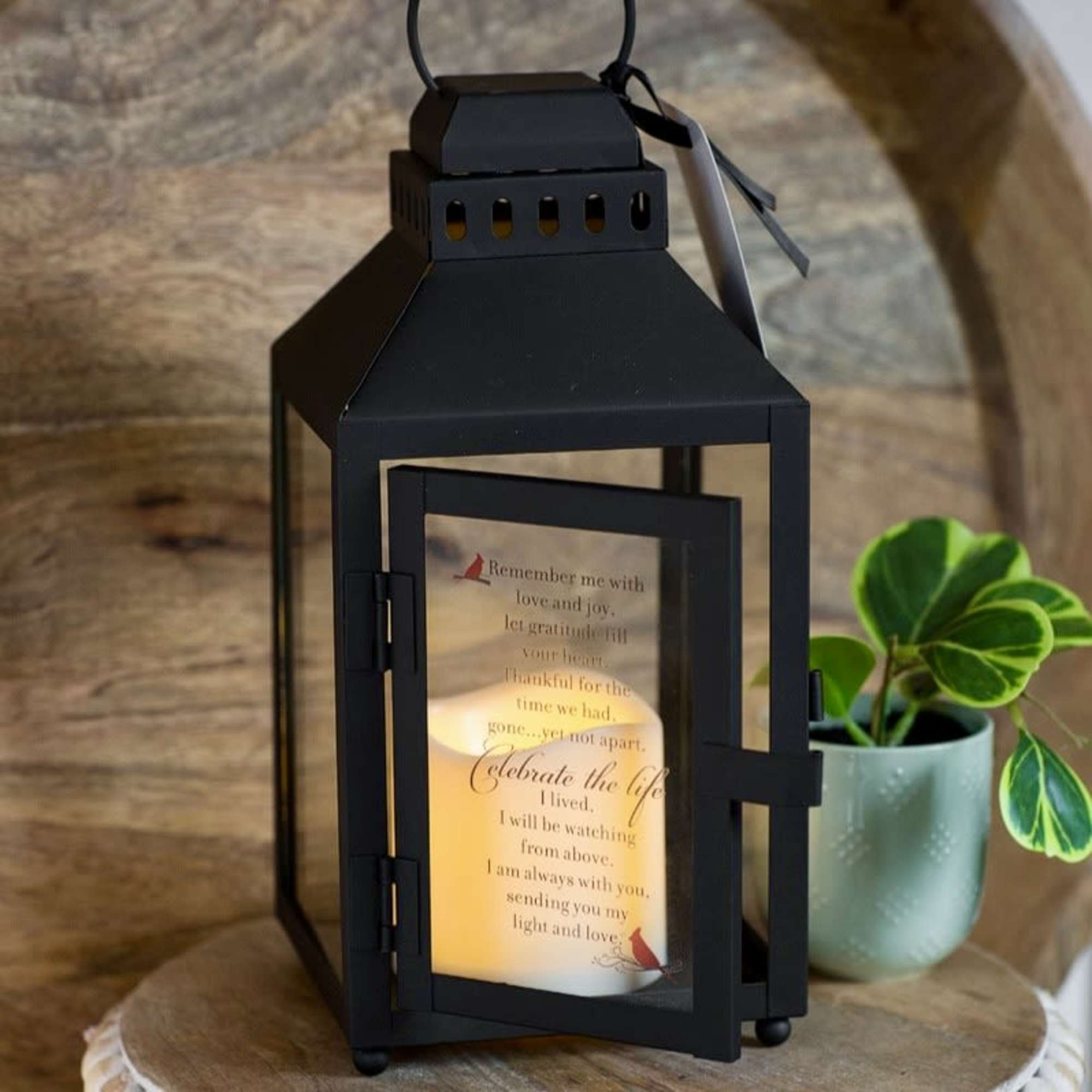 Bring warmth and remembrance to any space with this heartfelt memorial lantern.