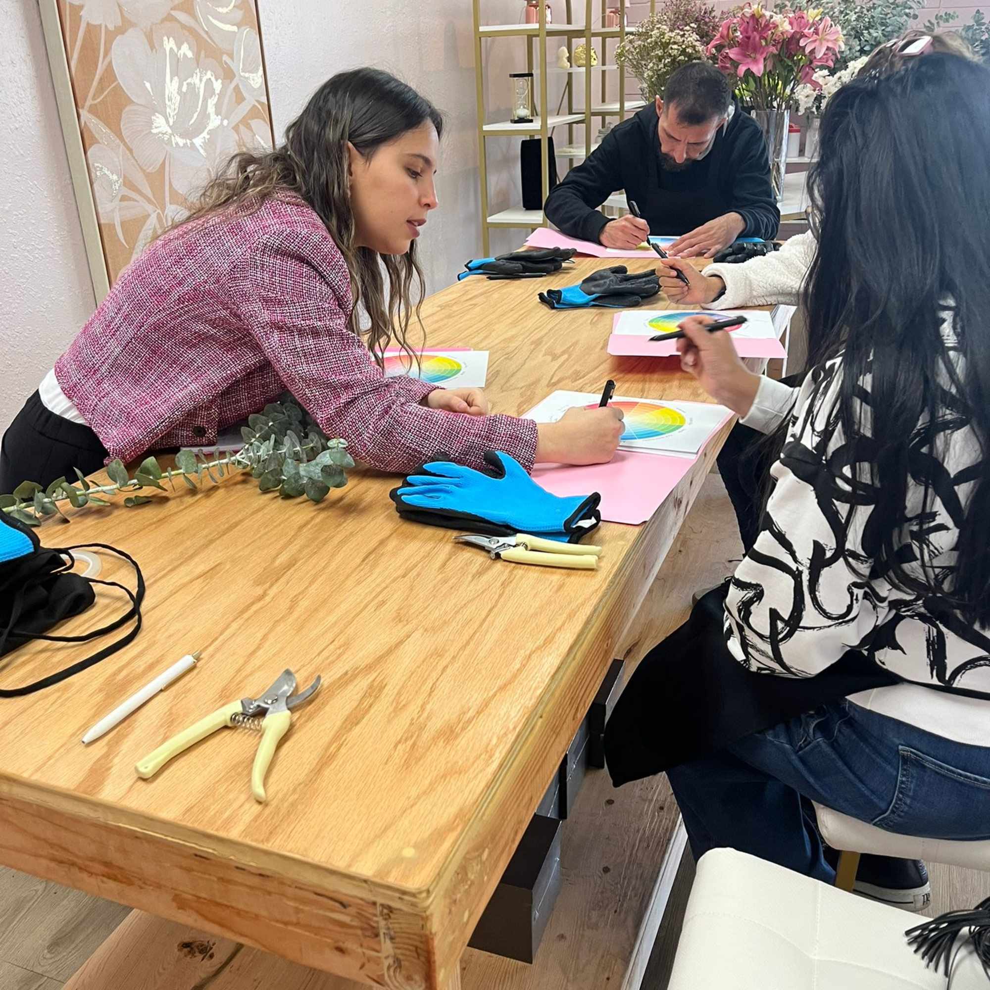 Learn the basics of floral art: handling fresh flowers, color combinations, and