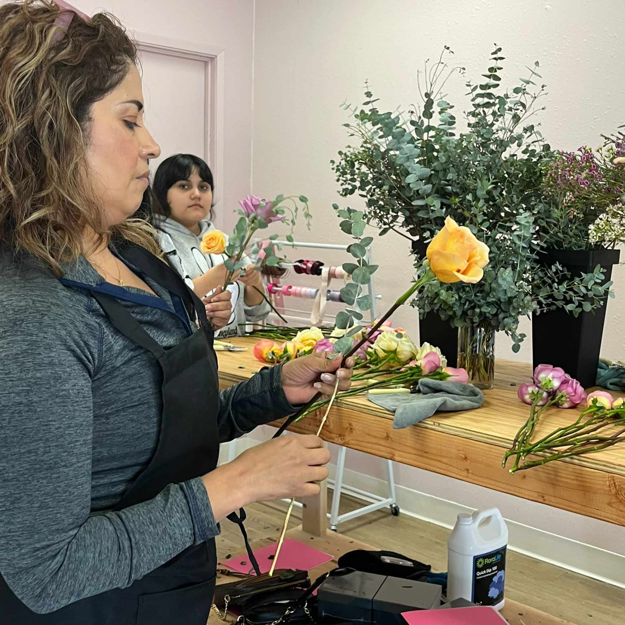Learn the basics of floral art: handling fresh flowers, color combinations, and