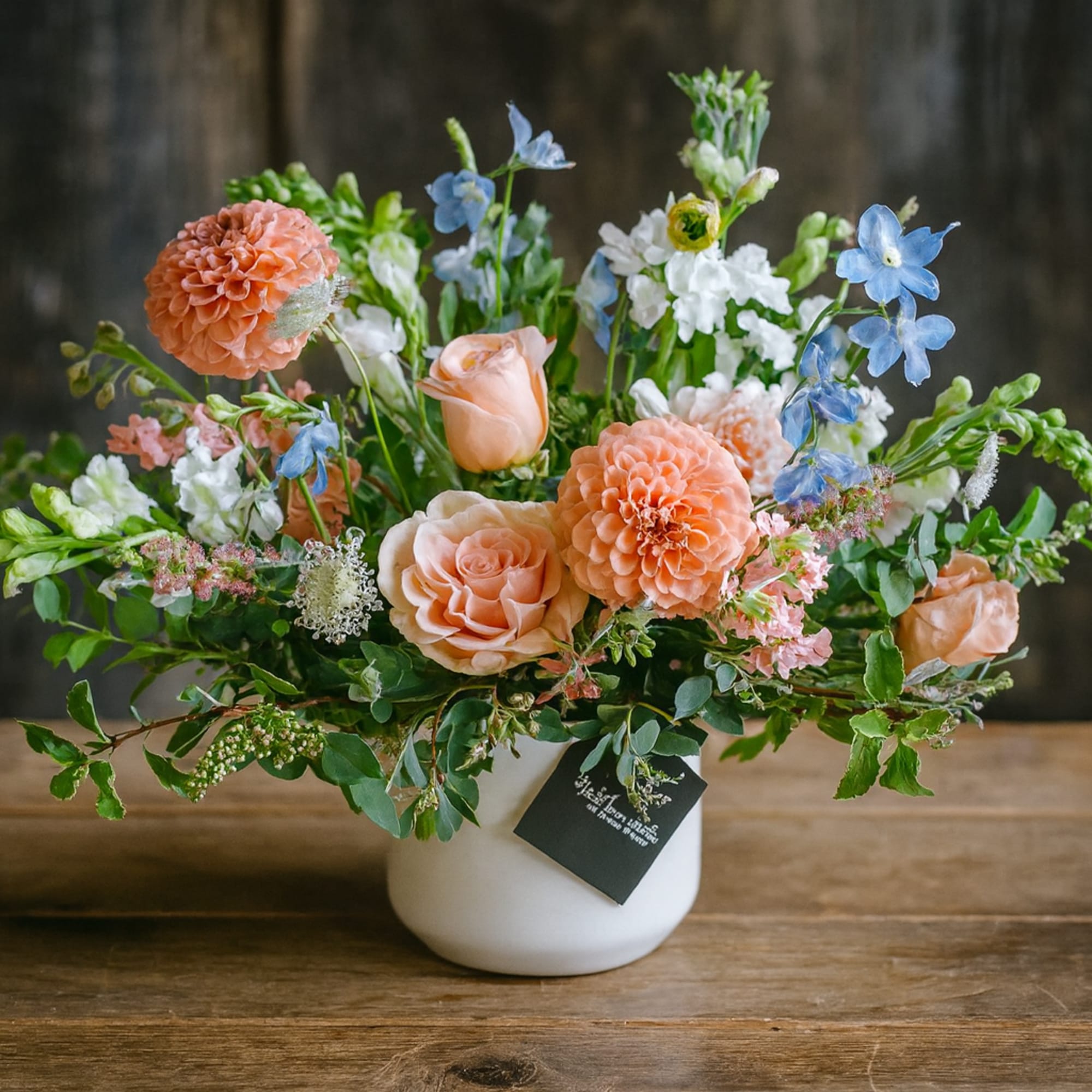 At Last is a breathtaking floral arrangement designed to capture the beauty