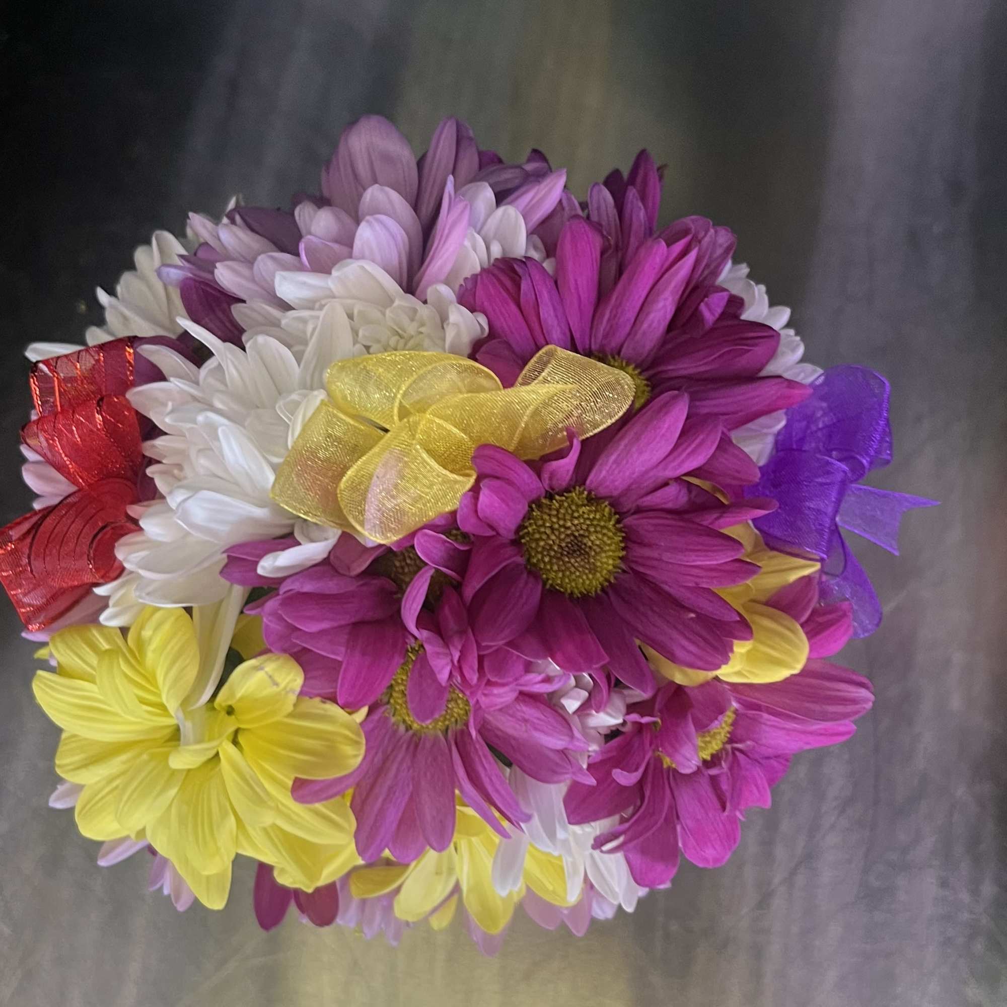 fresh flowers on a 8oz  coca cola   