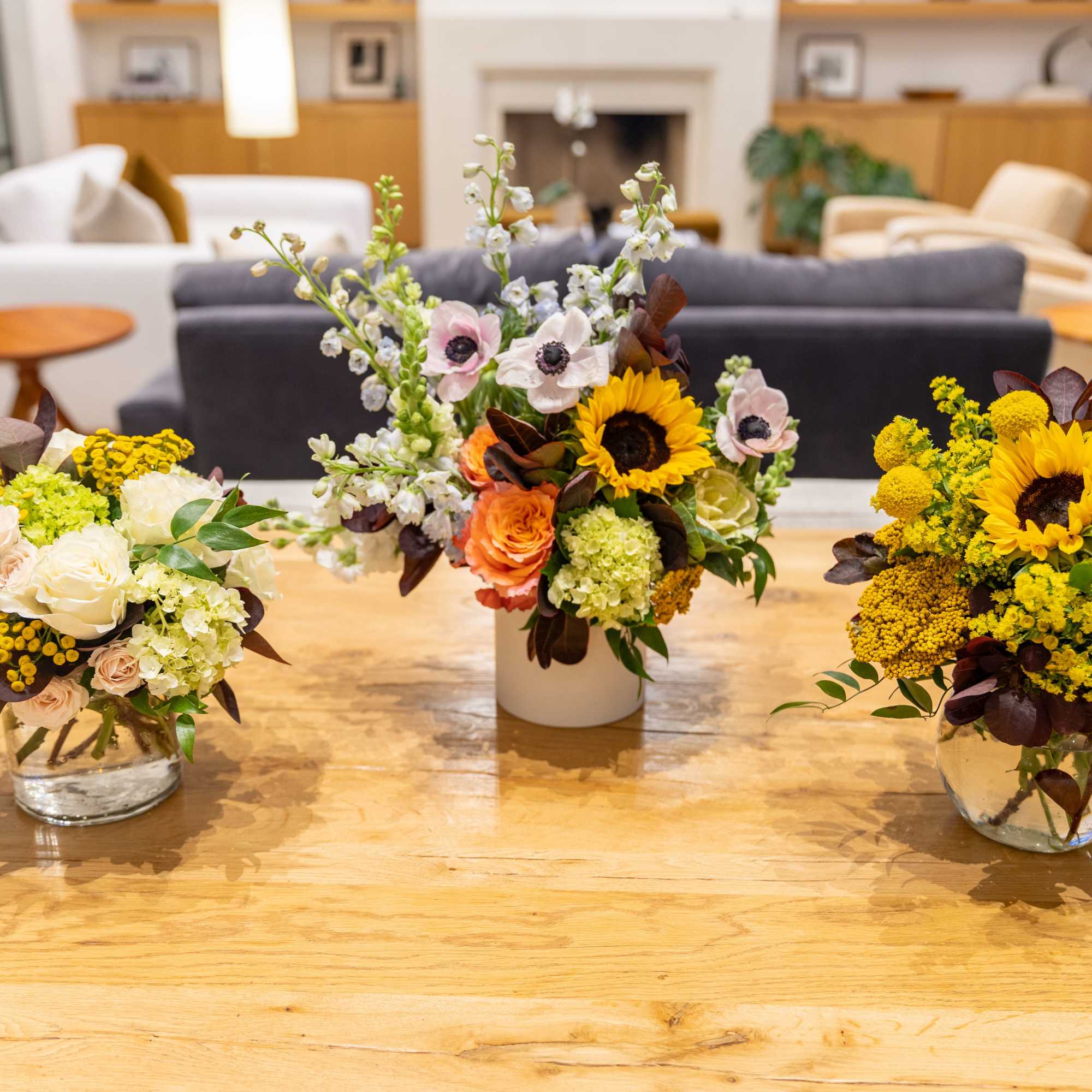 A fresh floral arrangement with season tones and blooms. The perfect centerpiece