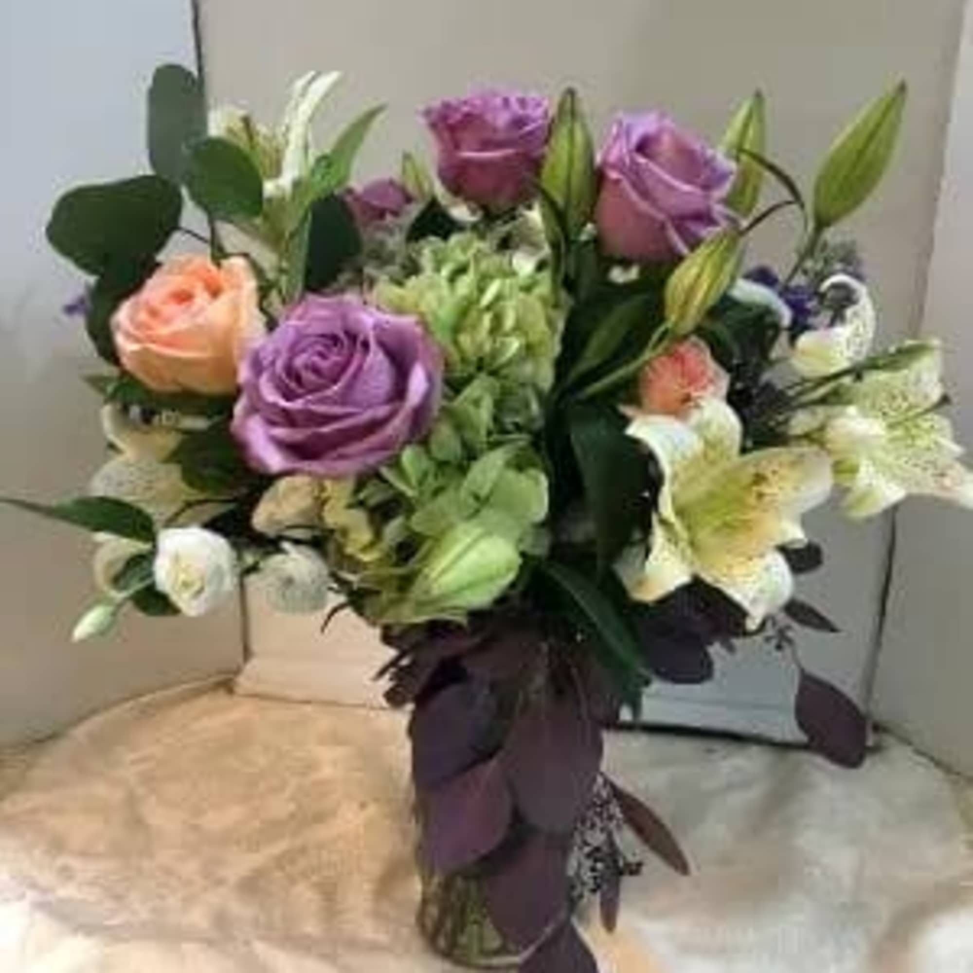Hydrangea, Lilies, Assorted  Roses, Lisianthus,  Fancy Greens Hydrangea, Lilies, Assorted  Roses, Lisianthus,  Fancy Greens