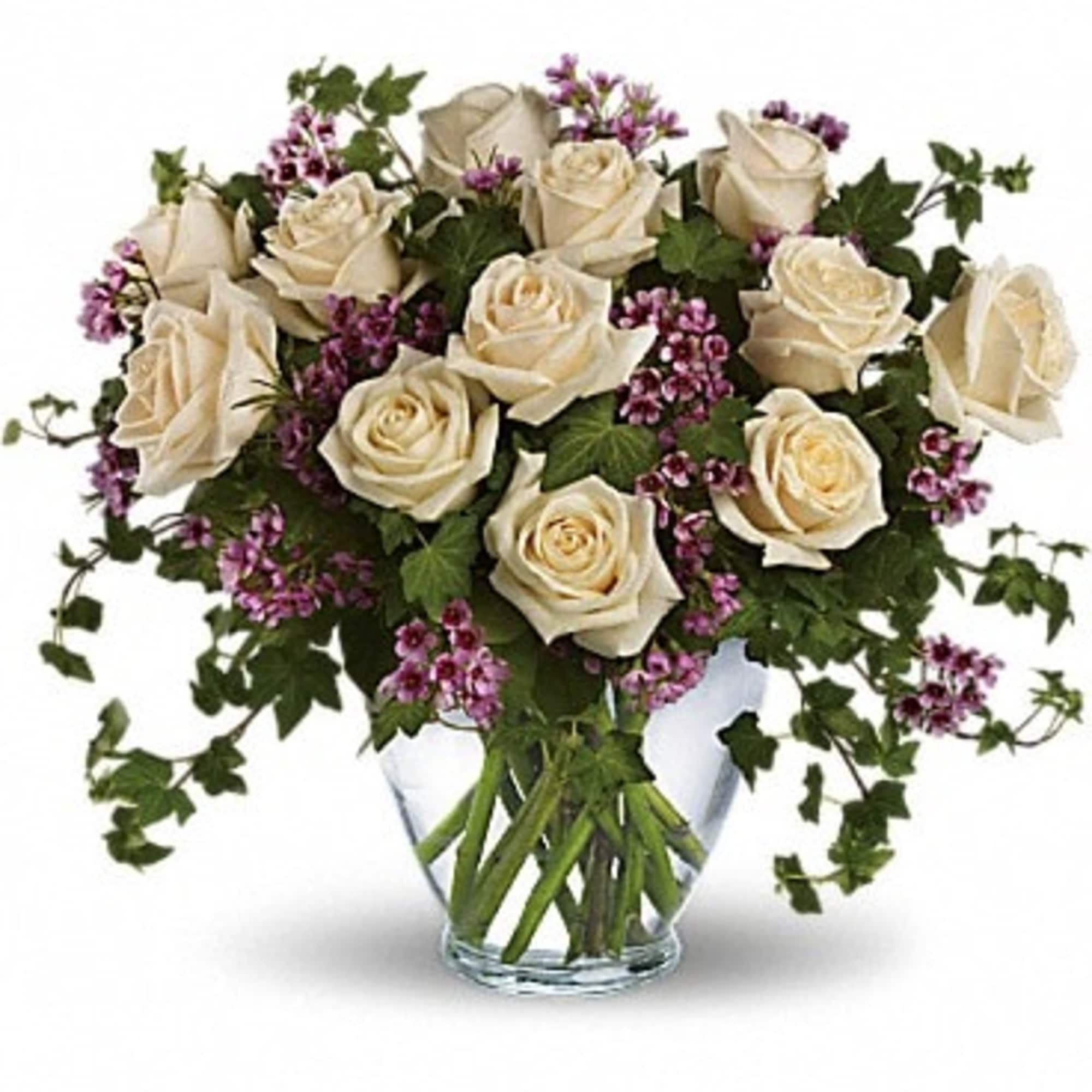 Romance blossoms beautifully within this elegant bouquet. The serenity and innocence of