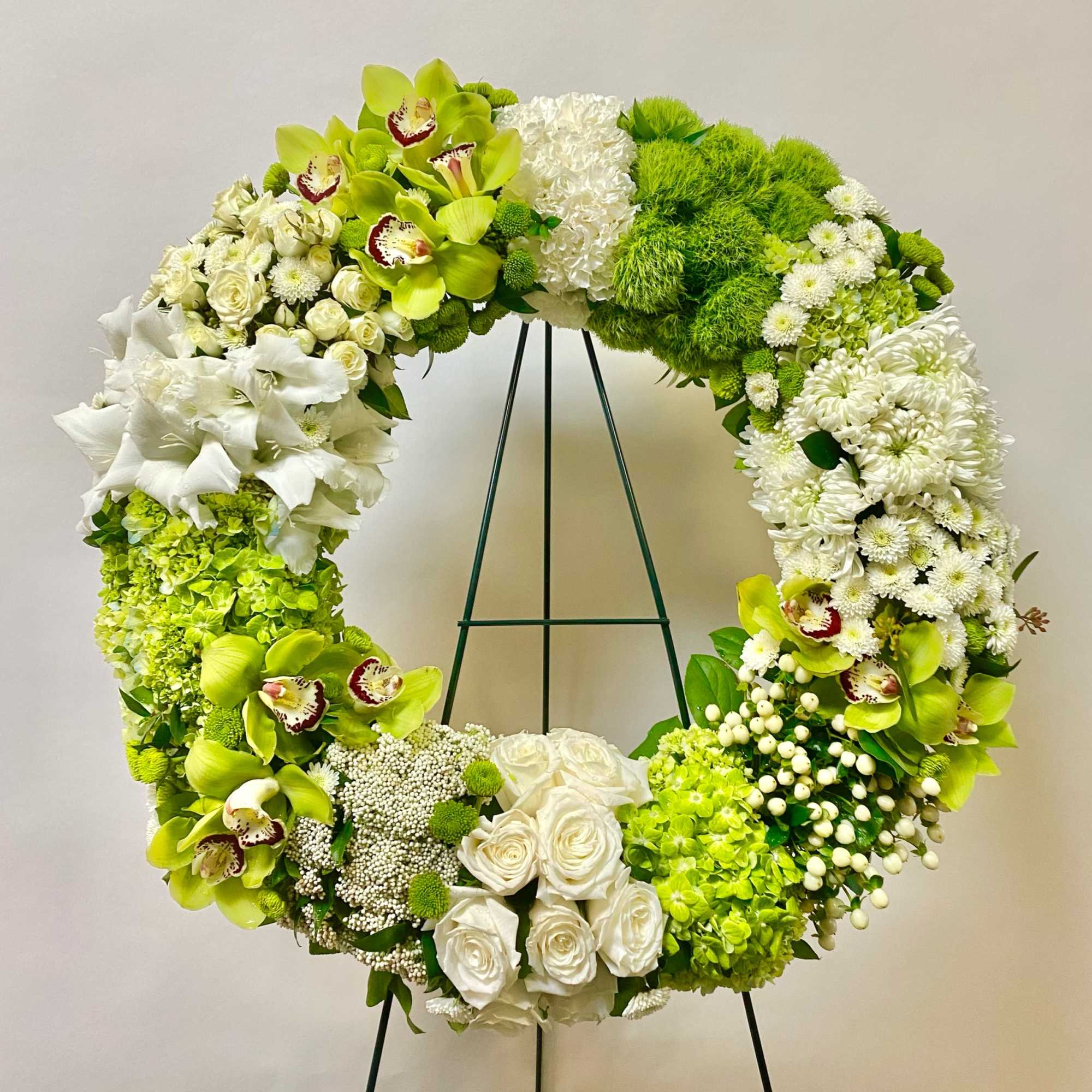 This All and Green Wreath Includes Green Cymbidium Orchids, Green Tricks, White