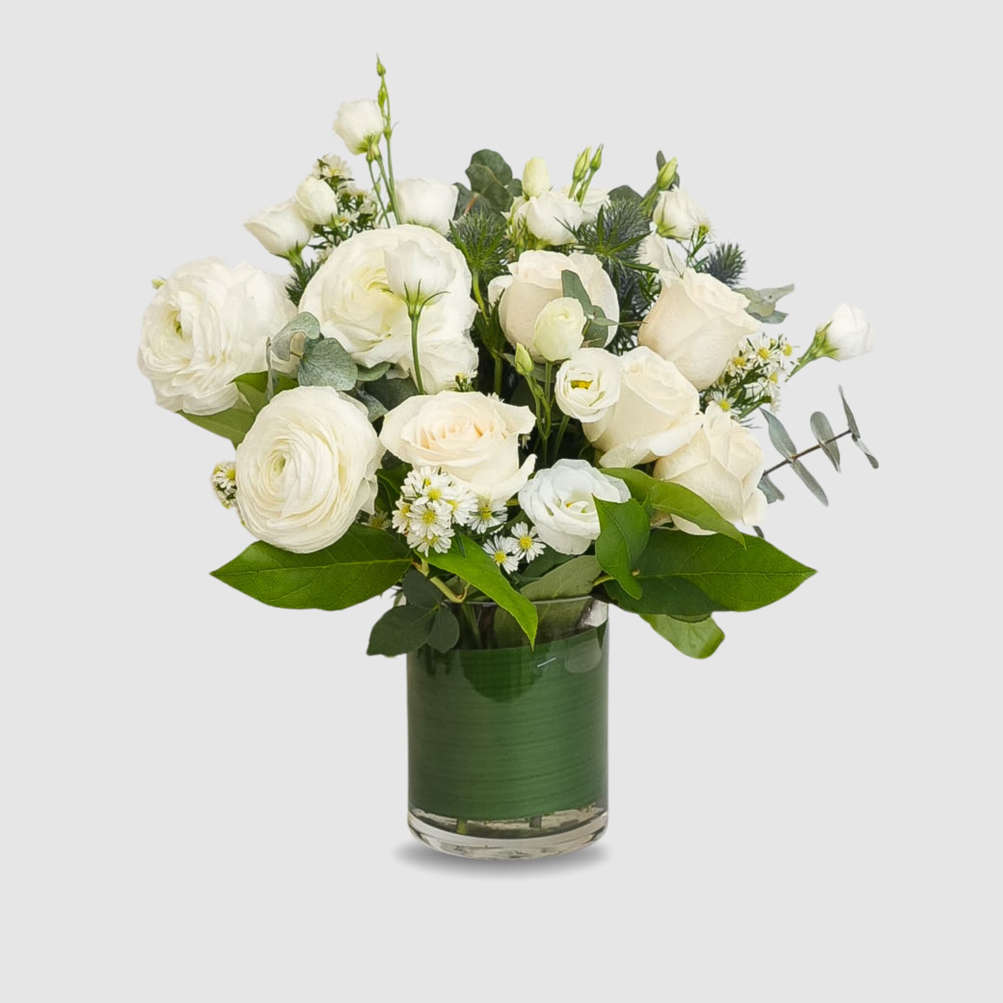 Arrangement contains : white roses, Lithuanians, Eucalyptus,Renanculus, waxThistle