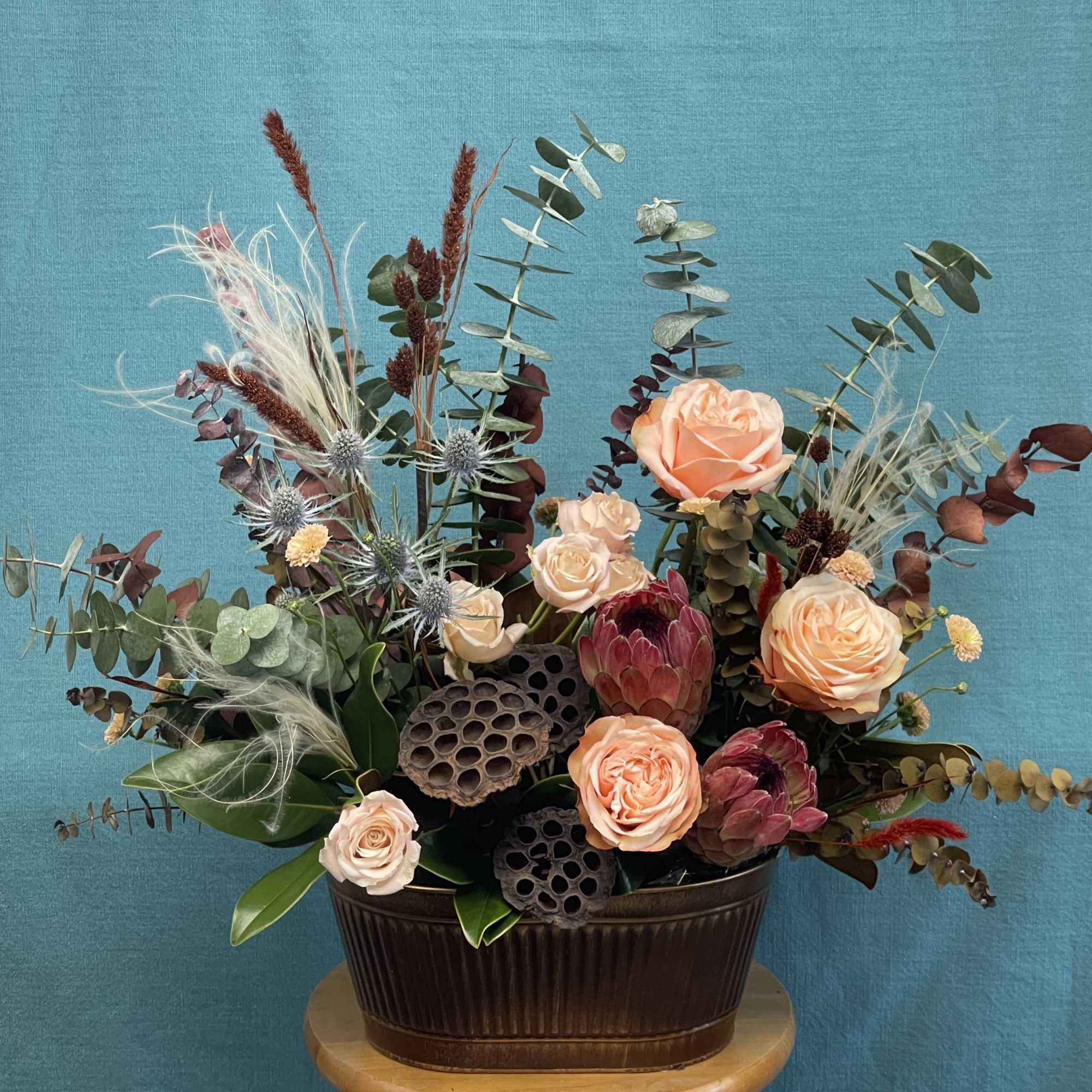 Autumn Elegance Arrangement
Capture the warmth and texture of the season with our