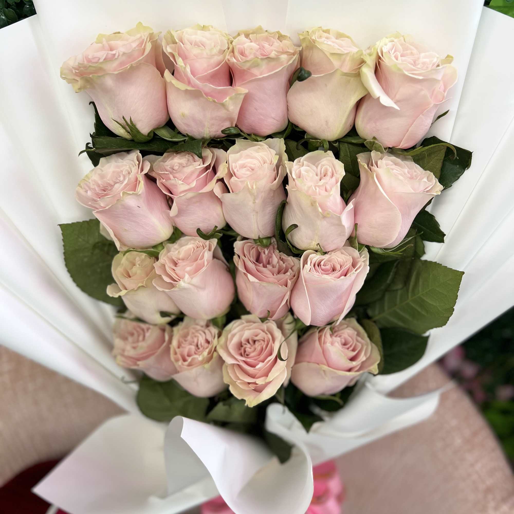 Graceful, gentle, and effortlessly elegant &mdash; our Wrapped Light Pink Rose Bouquet