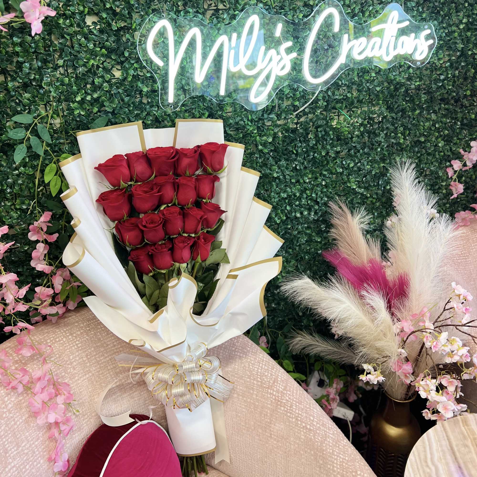 This is a stunning presentation of deep red roses, symbolizing passion and