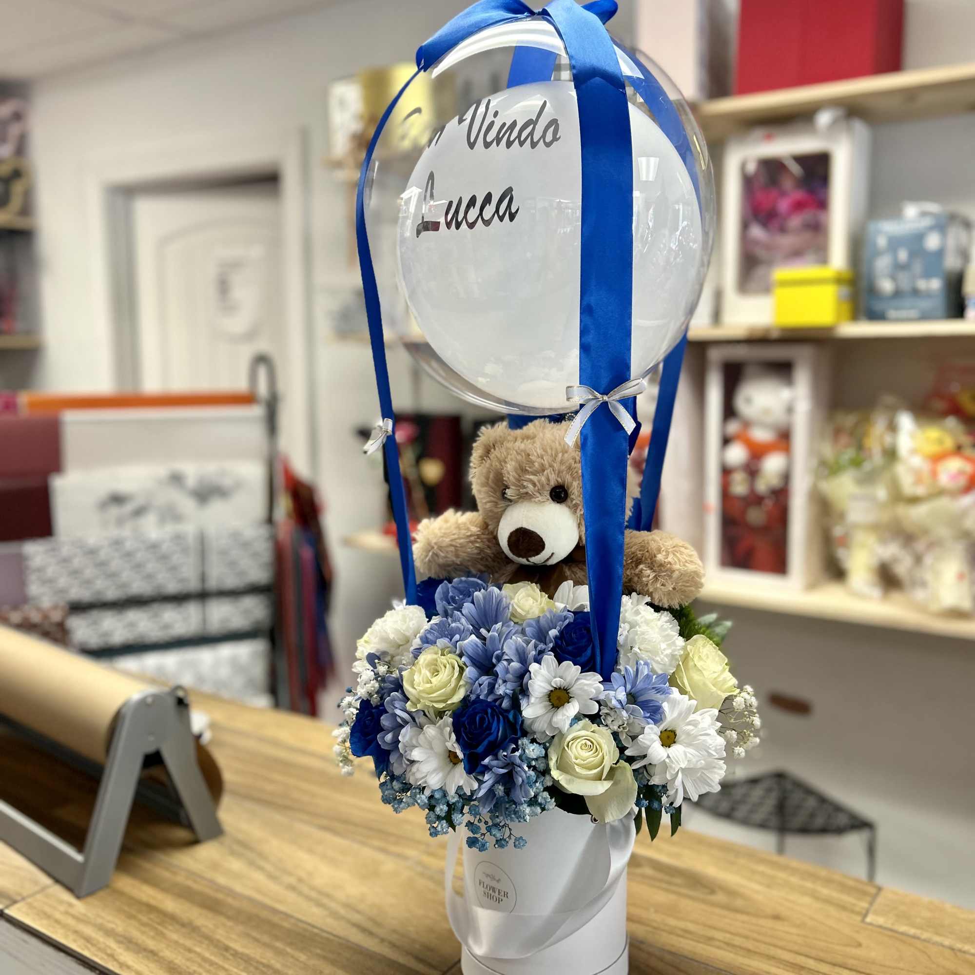 Welcome baby boy!! Beautiful floral arrangement in blue, light blue and white