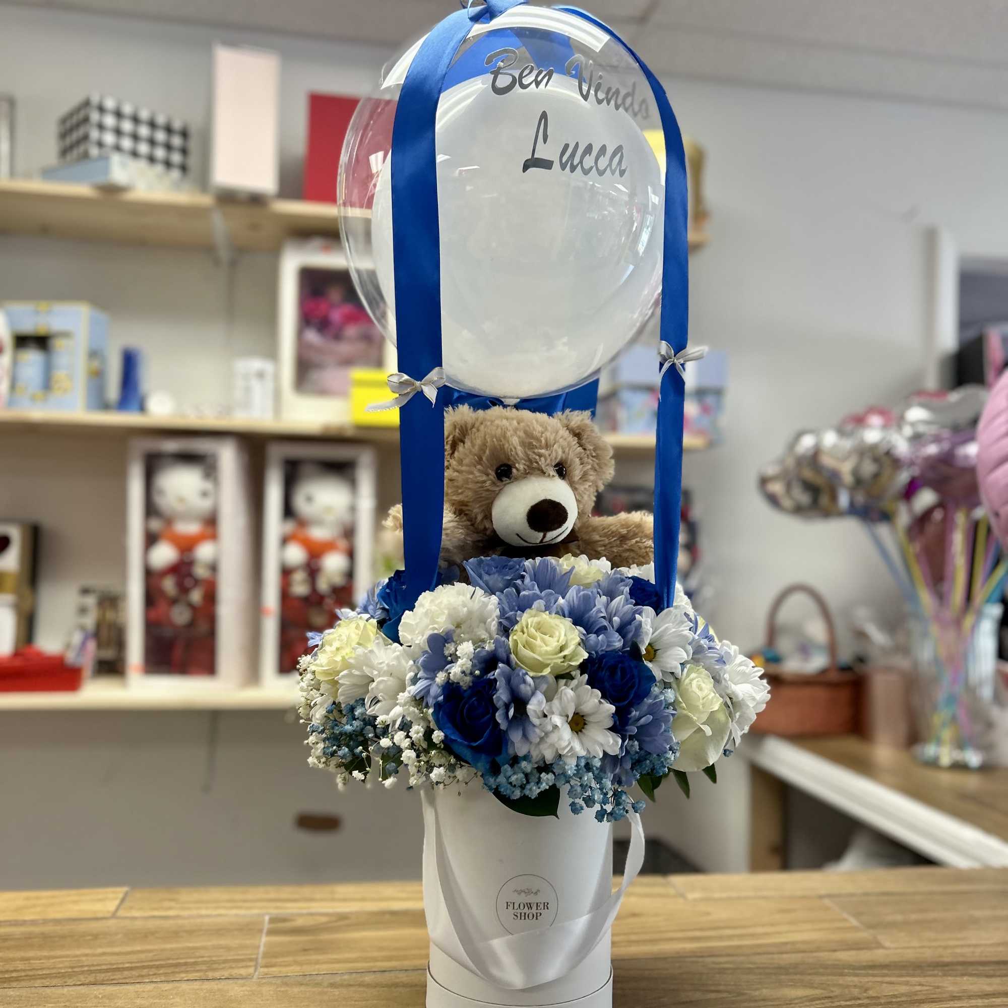 Welcome baby boy!! Beautiful floral arrangement in blue, light blue and white