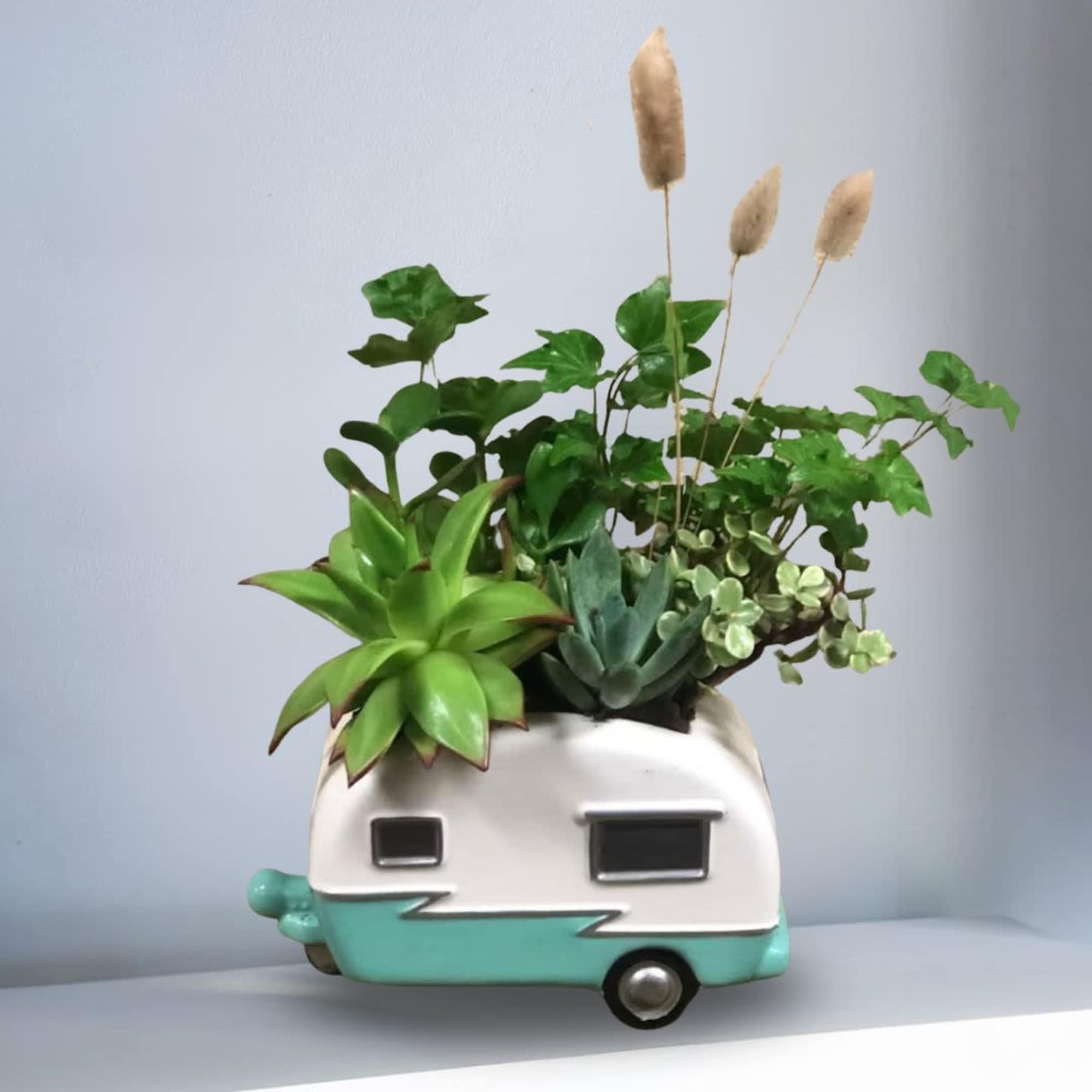 This arrangement is a great gift this summer. This design is inspired