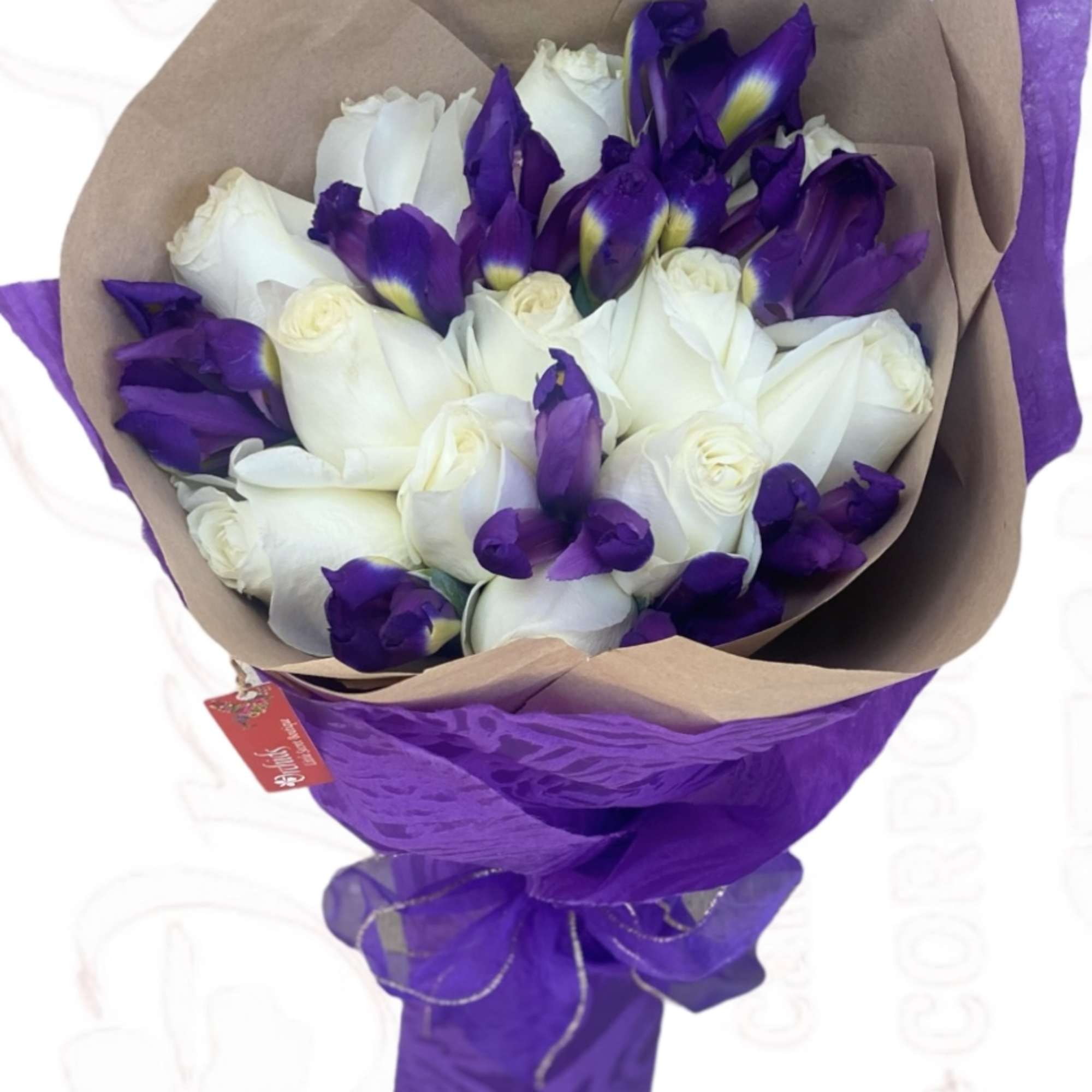 Send them this elegant white premium long stem roses accented with Iris