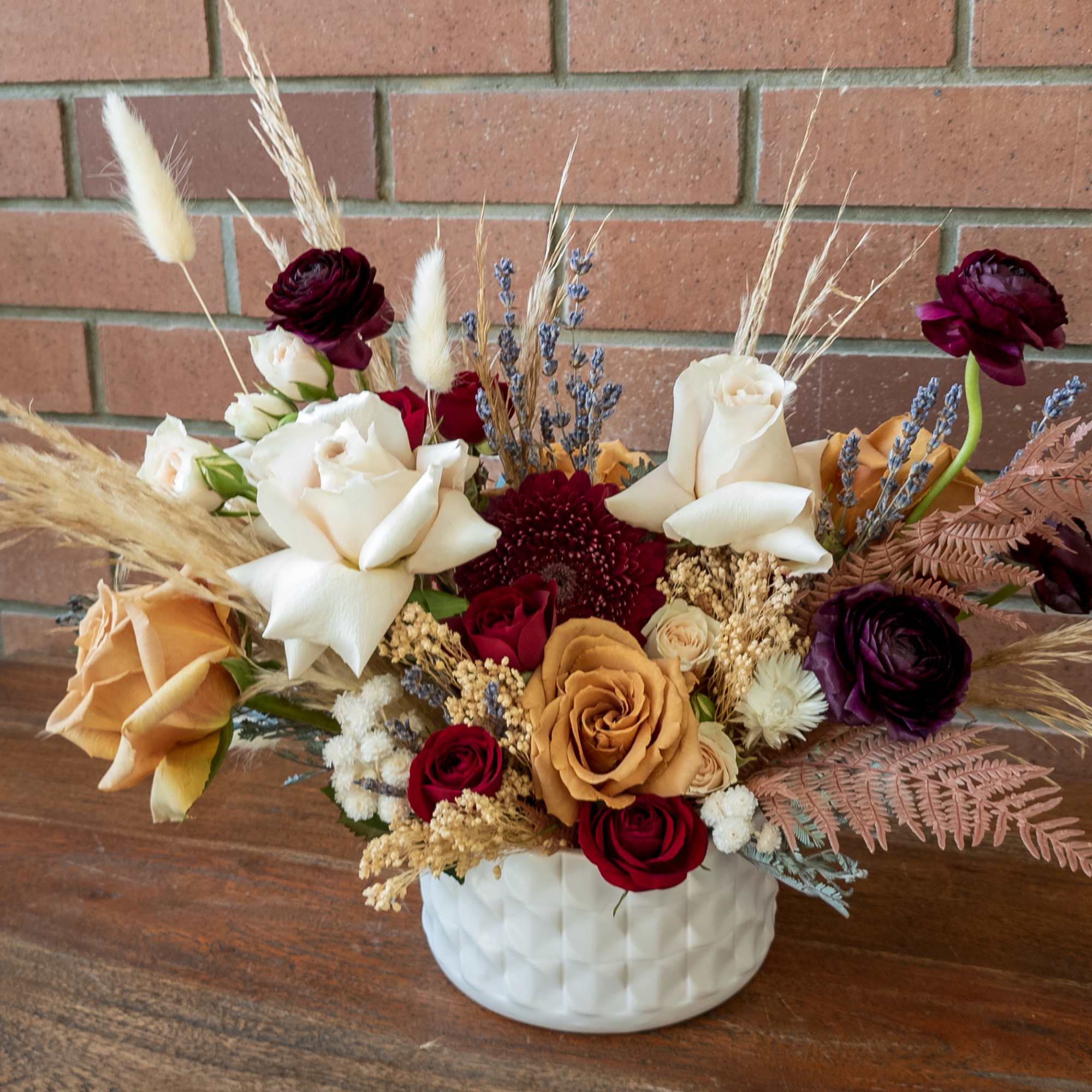 Burgundy reds beige and browns fresh cut roses, spray roses ranunculus mum Burgundy reds beige and browns fresh cut roses, spray roses ranunculus mum