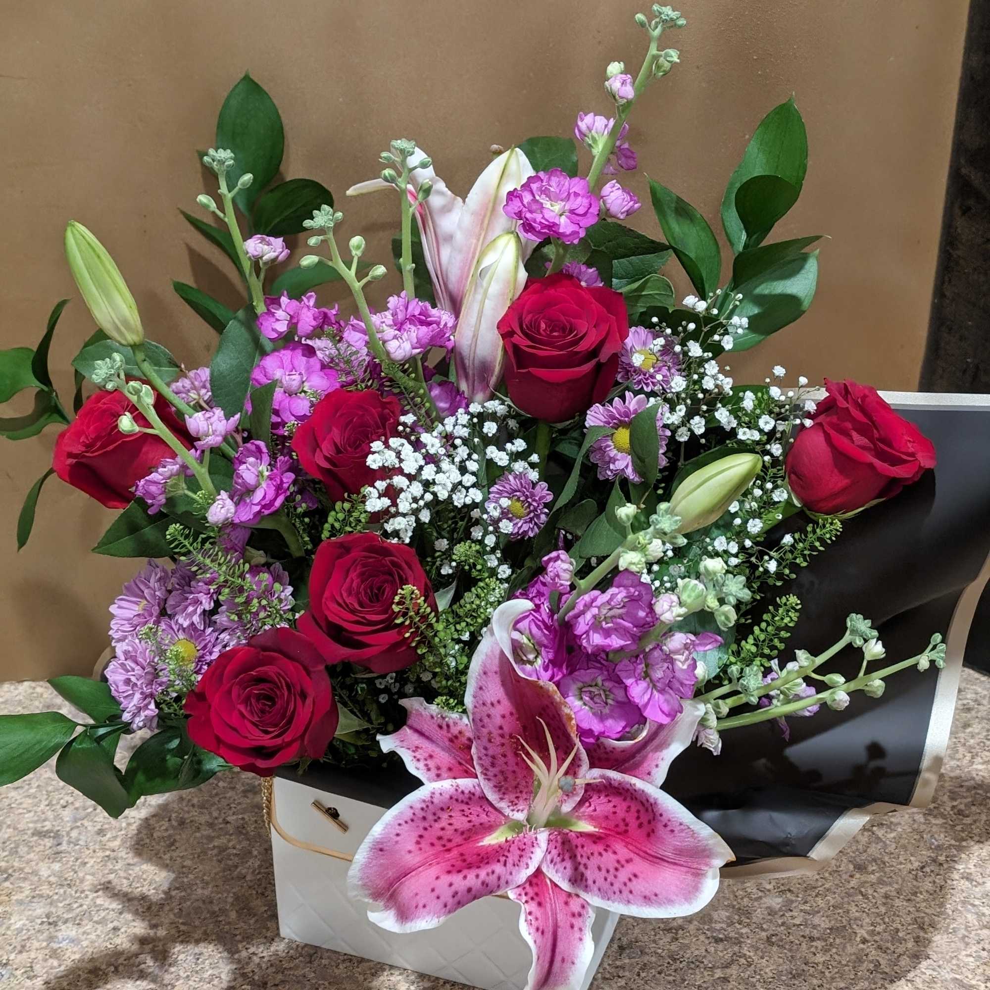 We are happy to offer  a beautiful arrangement with fresh, hand-picked