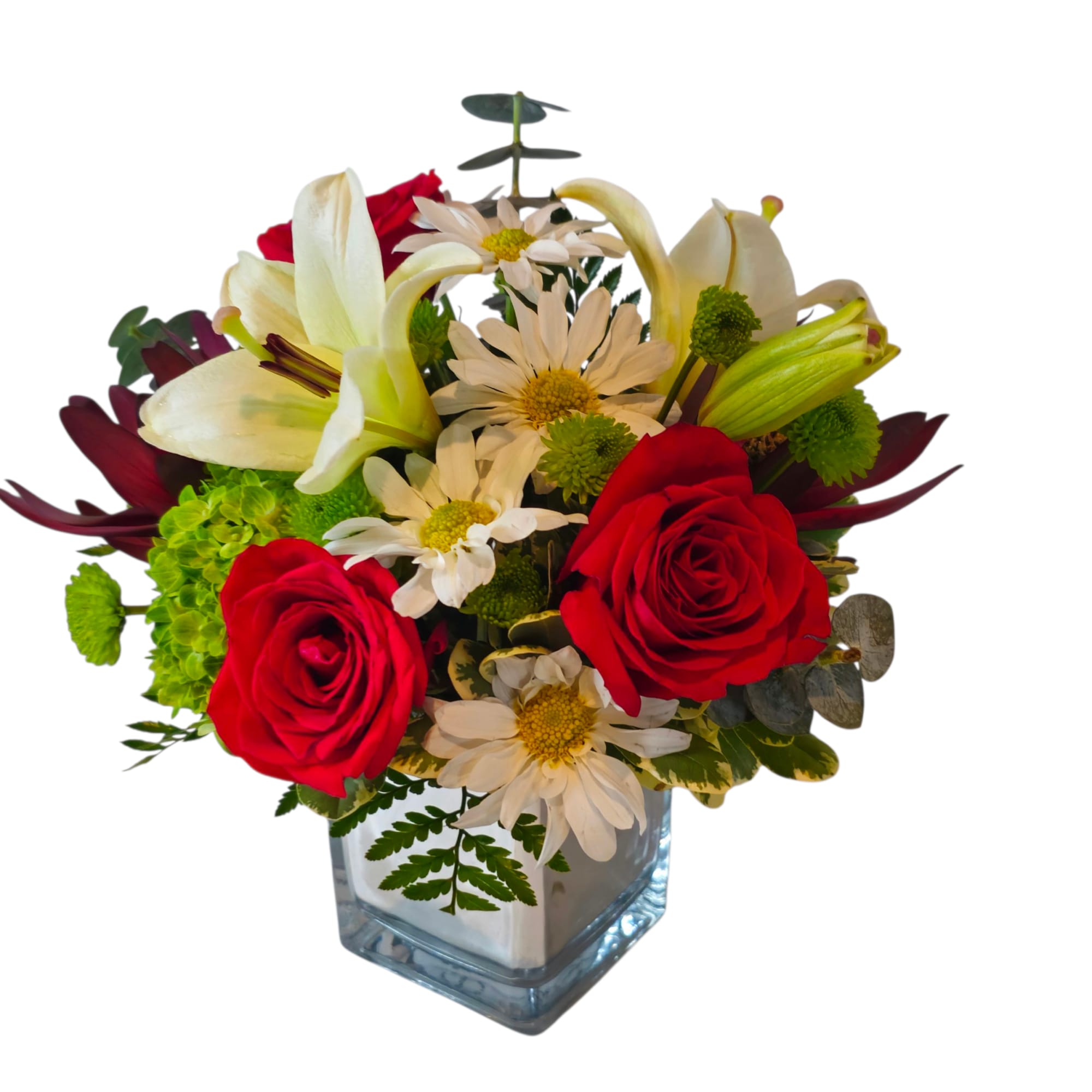 This stunning arrangement features rich red roses, exquisite white lilies, lively green