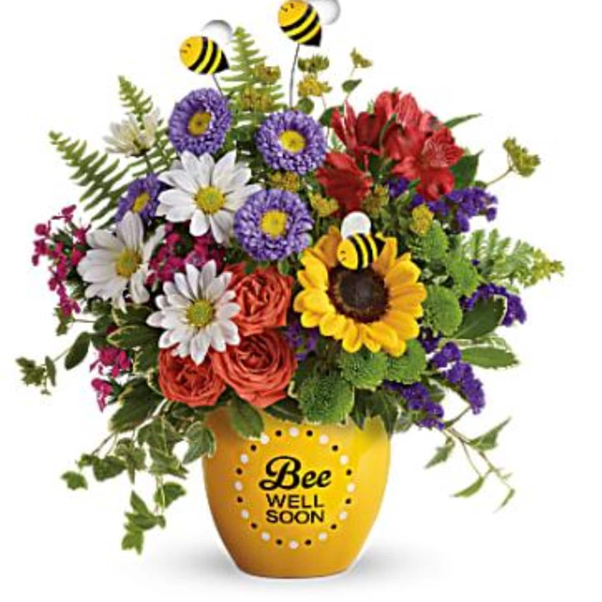 Tiny bees float among a vibrant and beautiful garden of yellow sunflowers Tiny bees float among a vibrant and beautiful garden of yellow sunflowers