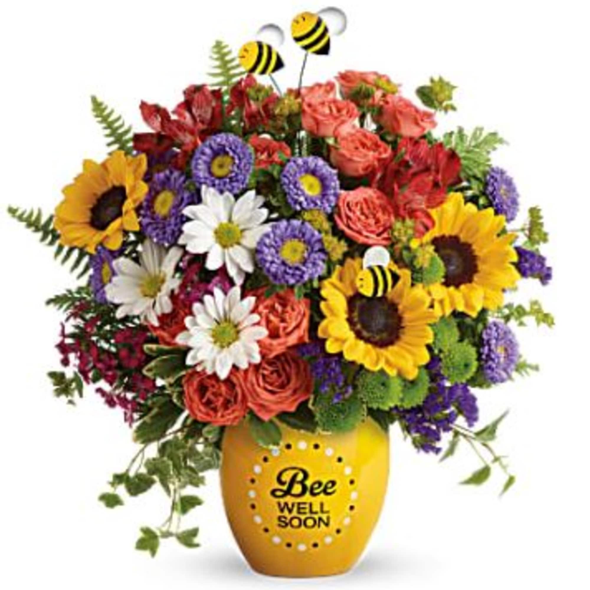 Tiny bees float among a vibrant and beautiful garden of yellow sunflowers Tiny bees float among a vibrant and beautiful garden of yellow sunflowers