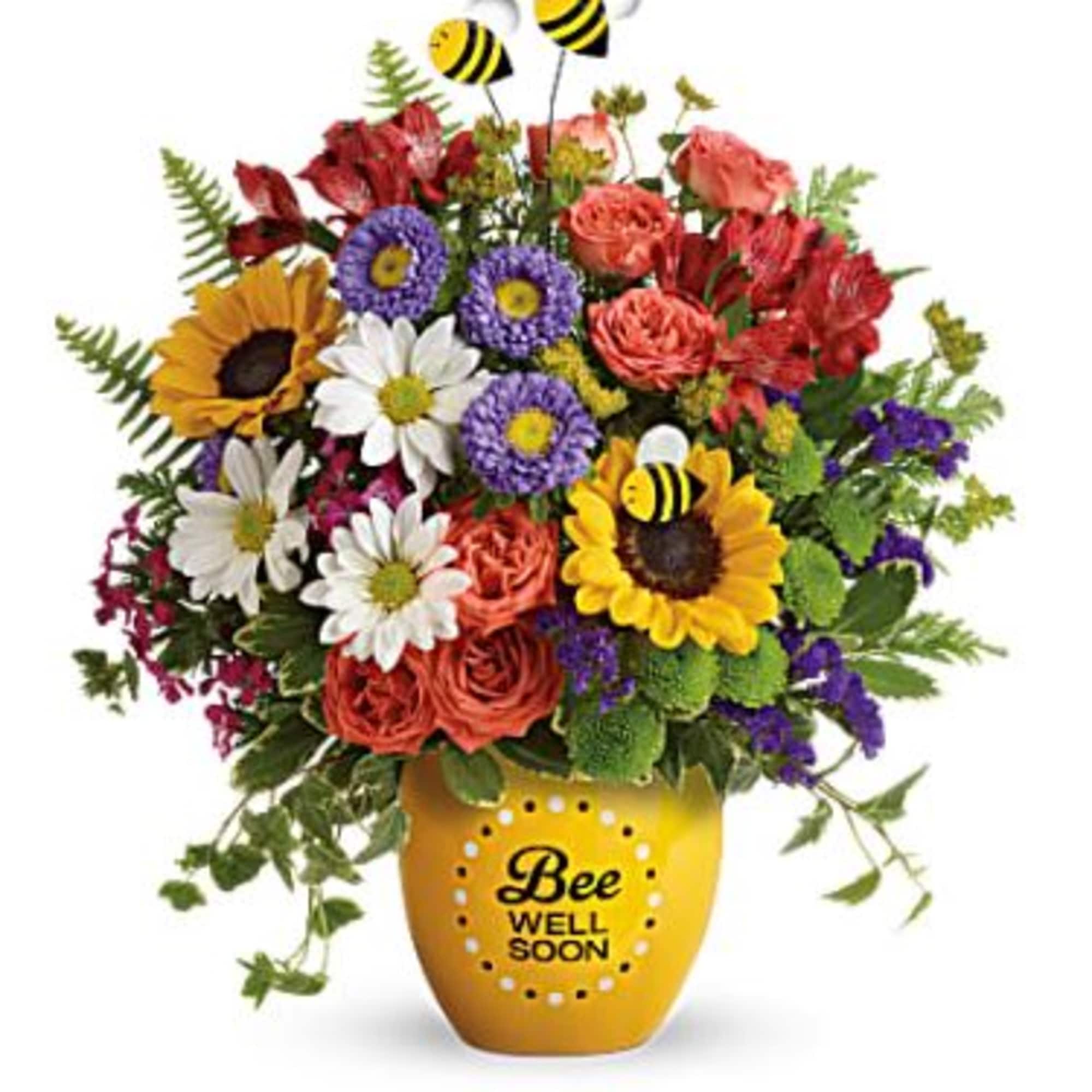 Tiny bees float among a vibrant and beautiful garden of yellow sunflowers Tiny bees float among a vibrant and beautiful garden of yellow sunflowers
