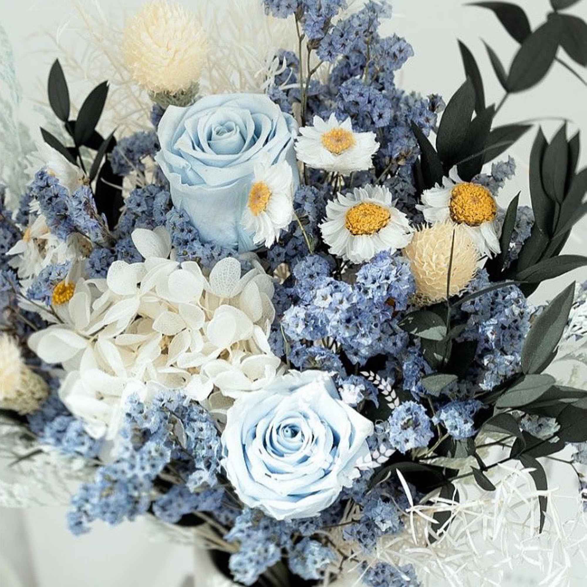 These bouquets are ever lasting flower arrangements featuring 100% premium quality dried