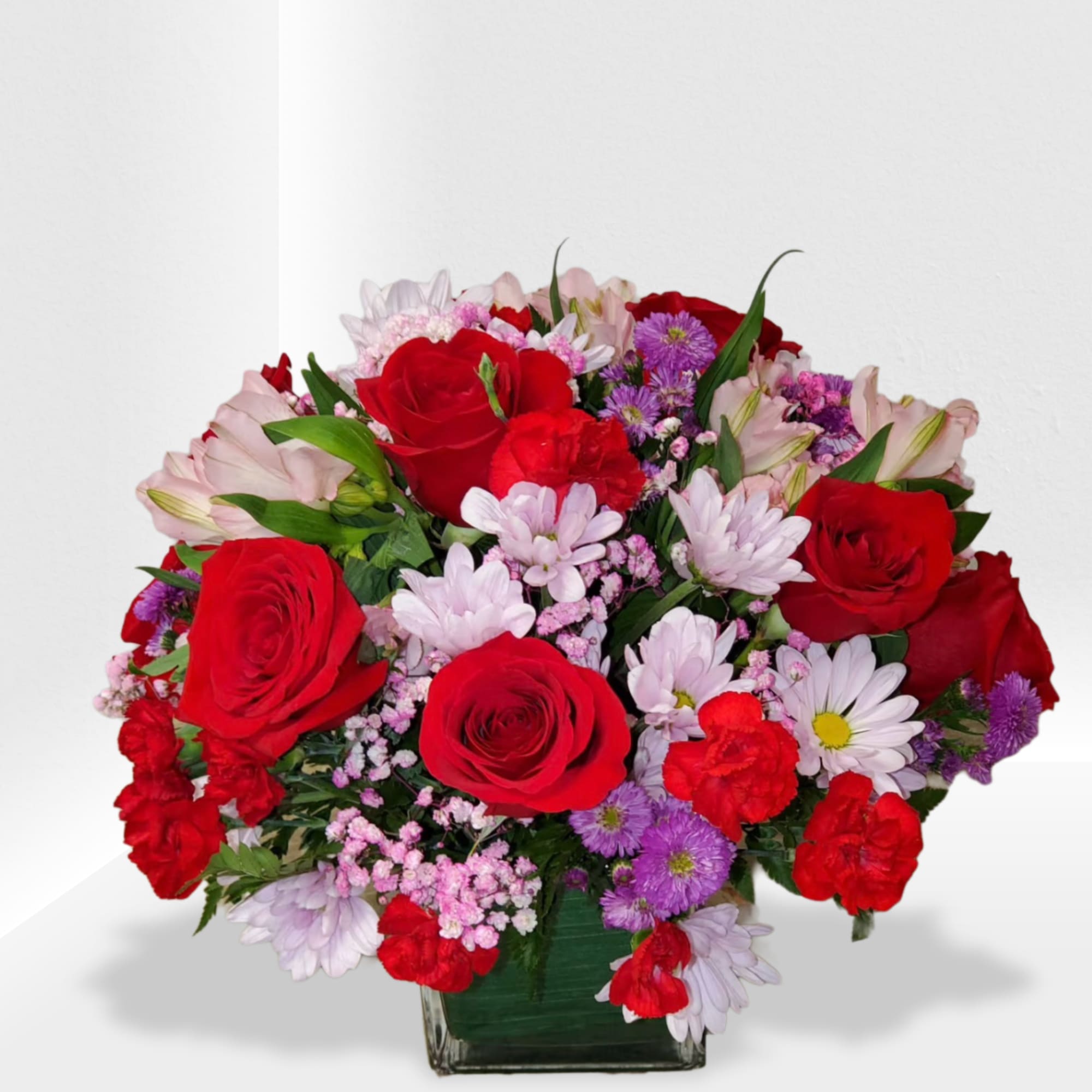 Mix arrangement in a square vase 