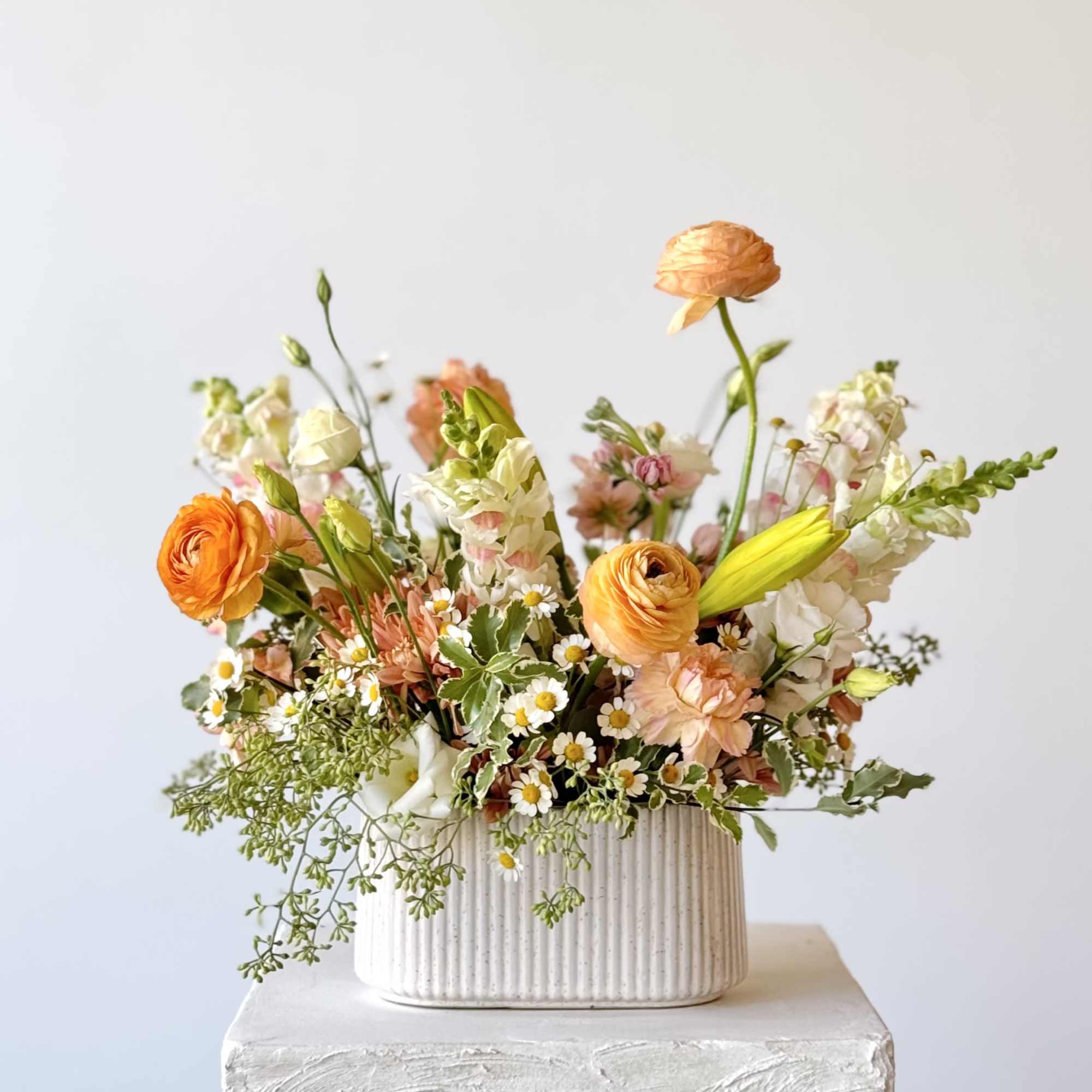 Experience the art of floristry with our Designer&#039;s Choice Floral Arrangement. Each