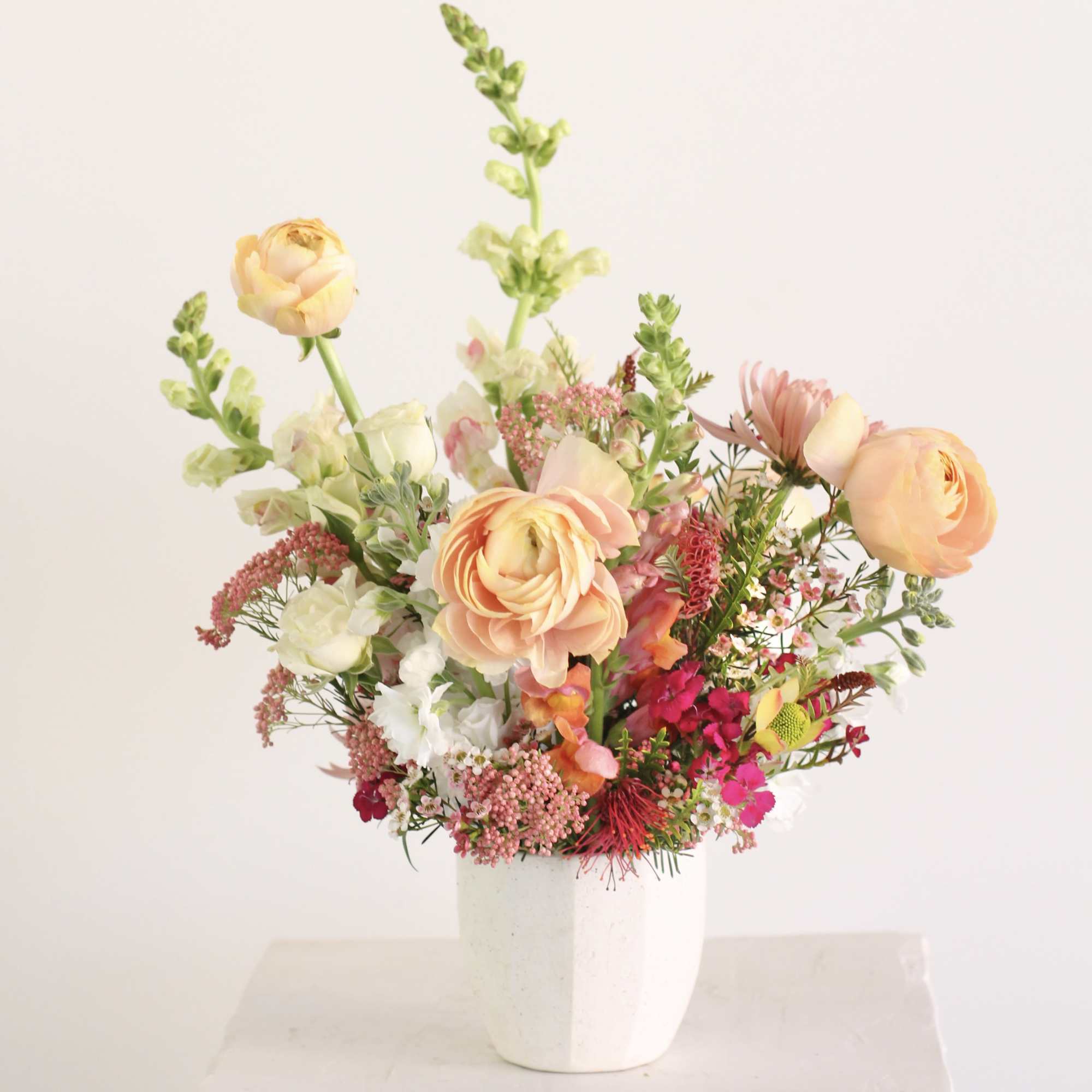 Experience the art of floristry with our Designer&#039;s Choice Floral Arrangement. Each
