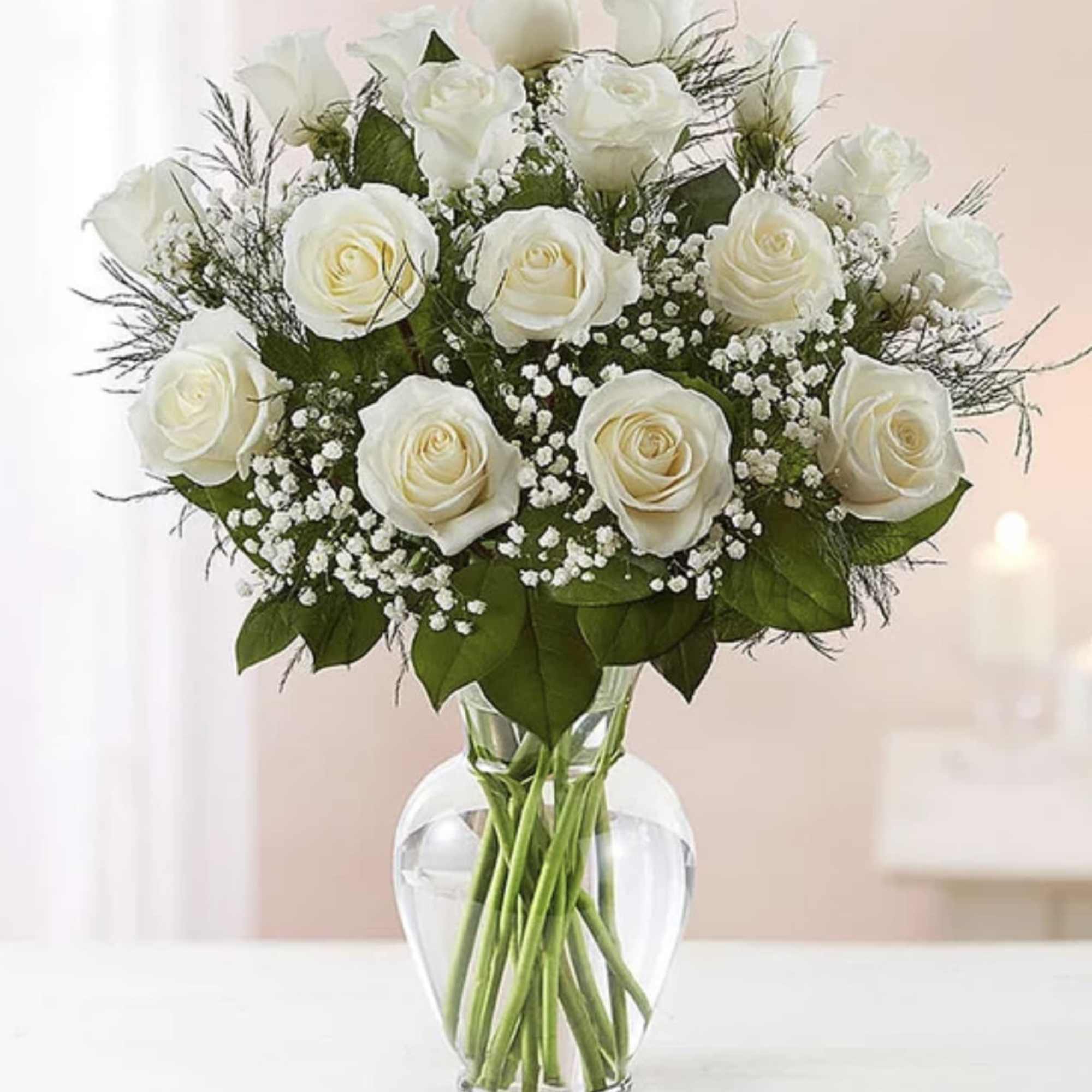 A dozen white roses are a classic gift! Perfect for Valentine's Day A dozen white roses are a classic gift! Perfect for Valentine's Day