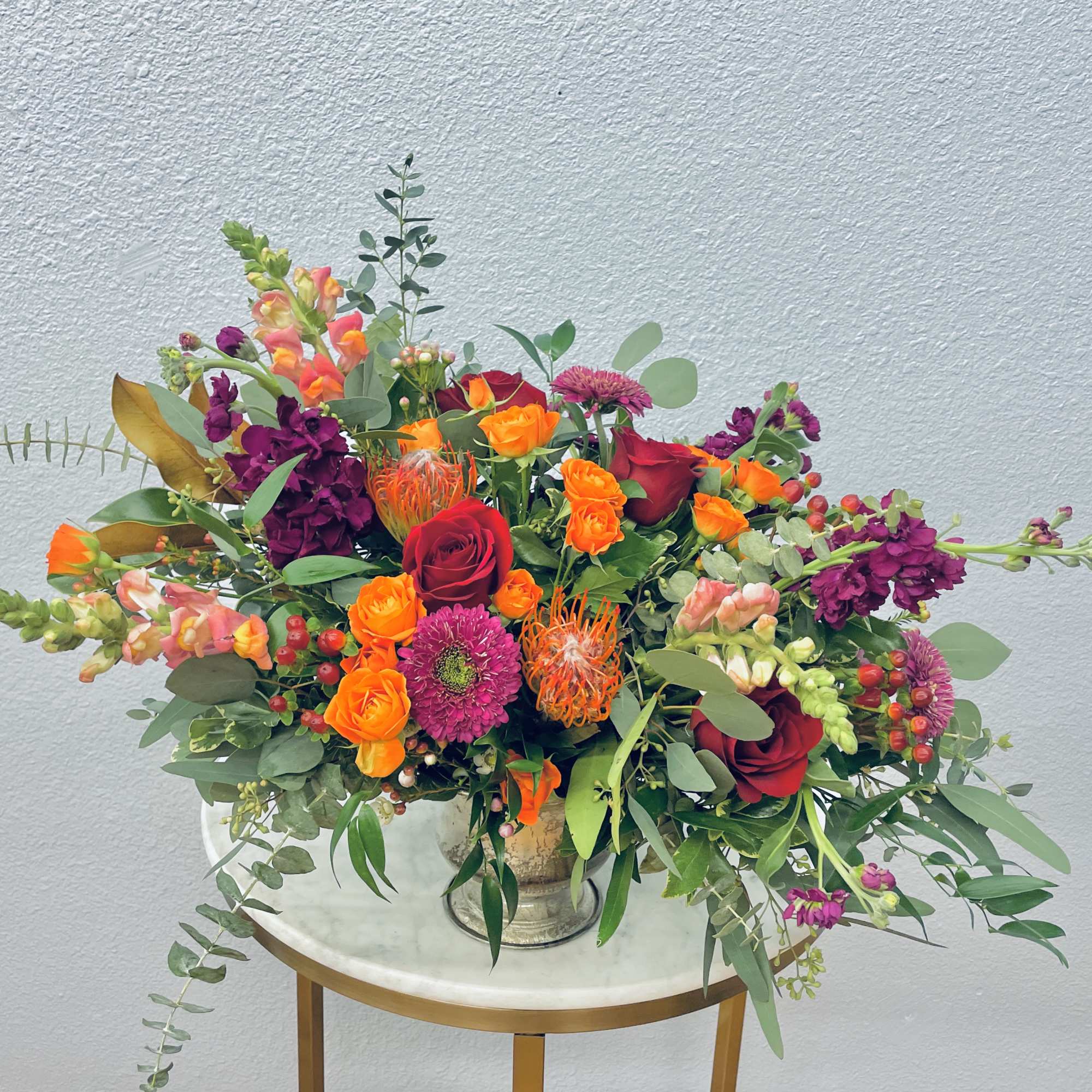 Color Palette: orange, red, purple, pink, green
Warm orange, red and burgundy pin