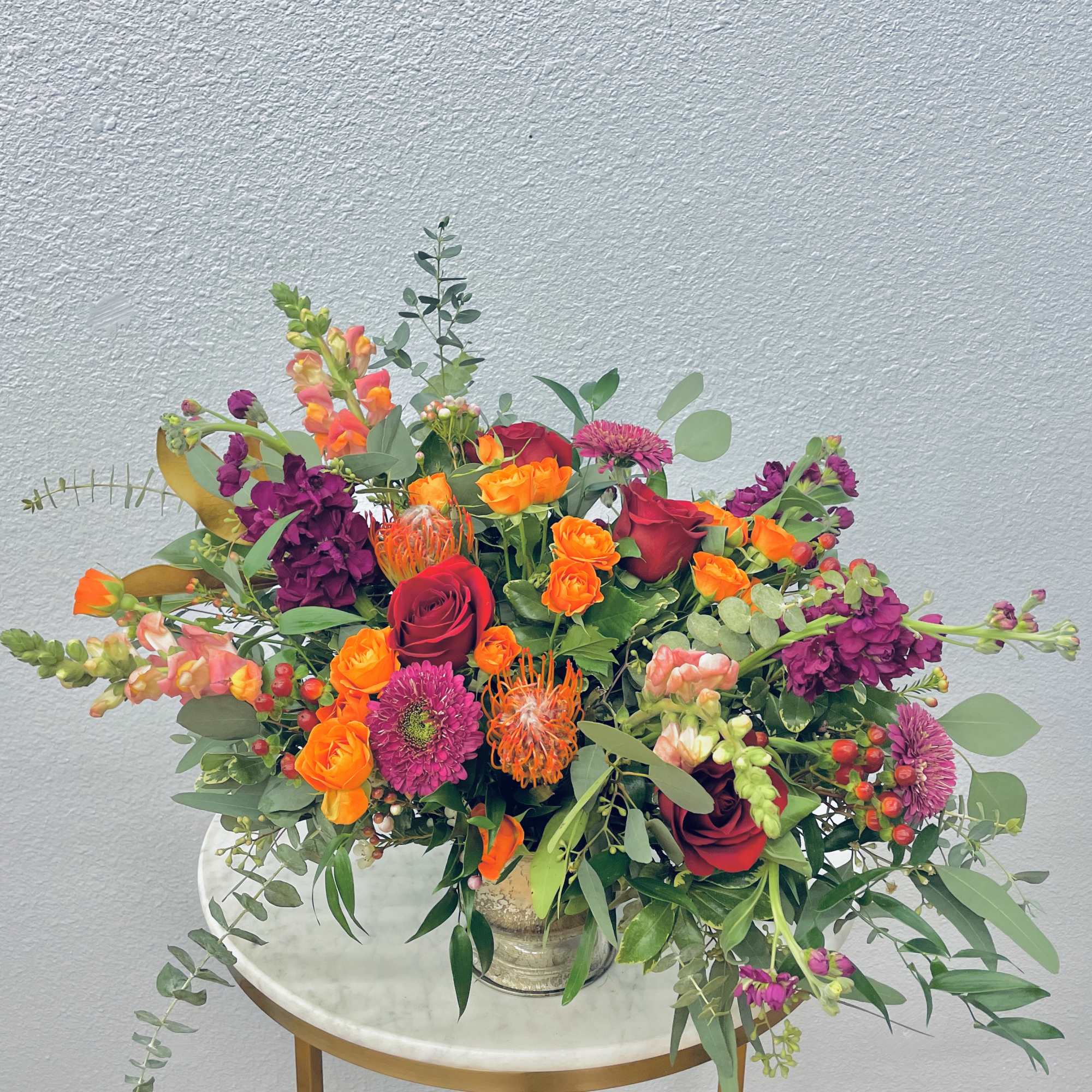 Color Palette: orange, red, purple, pink, green
Warm orange, red and burgundy pin