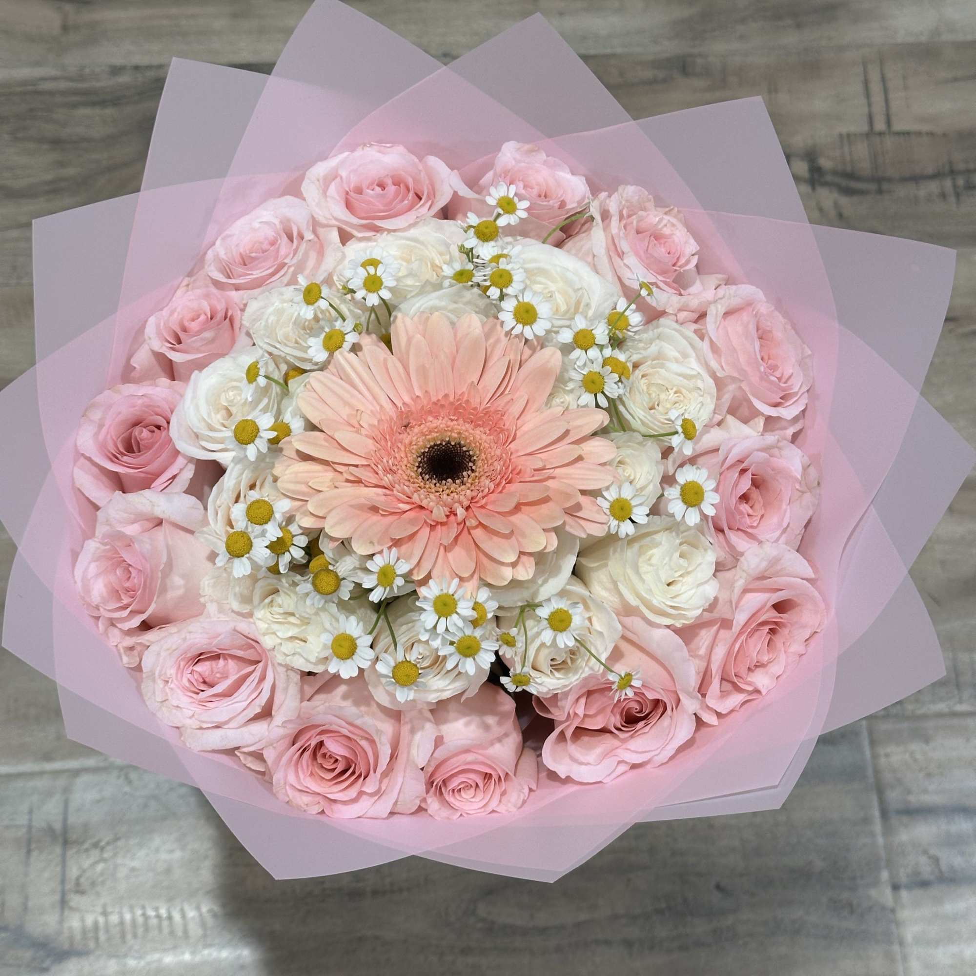 Combination of Pink and White Ecuadorian Roses with a gerbera in the