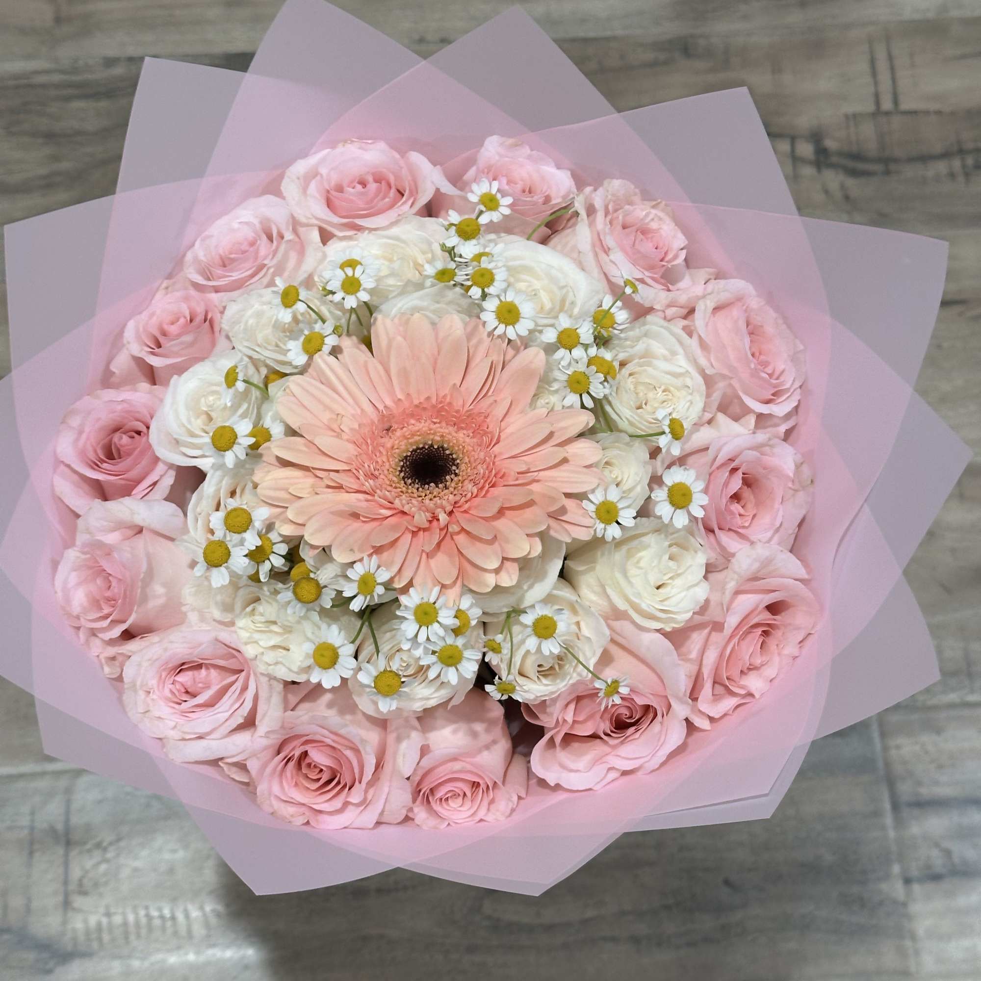 Combination of Pink and White Ecuadorian Roses with a gerbera in the