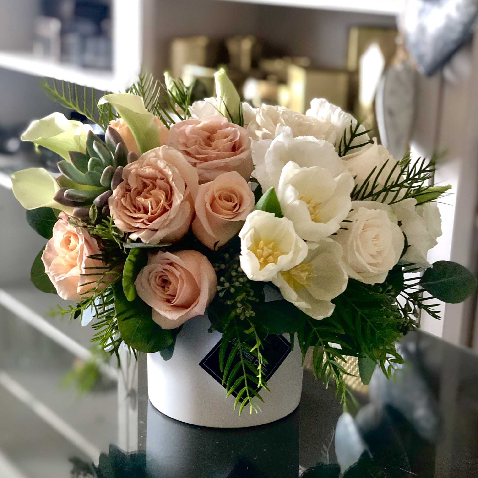 Introducing Sunset Passion, a truly stunning flower arrangement that will bring incredible