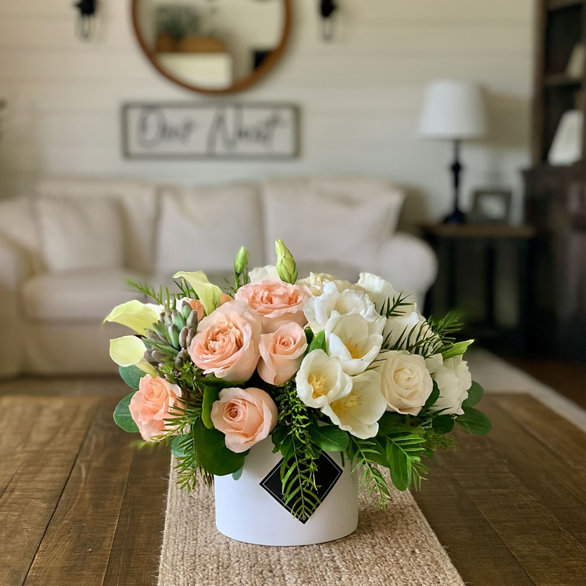 Introducing Sunset Passion, a truly stunning flower arrangement that will bring incredible