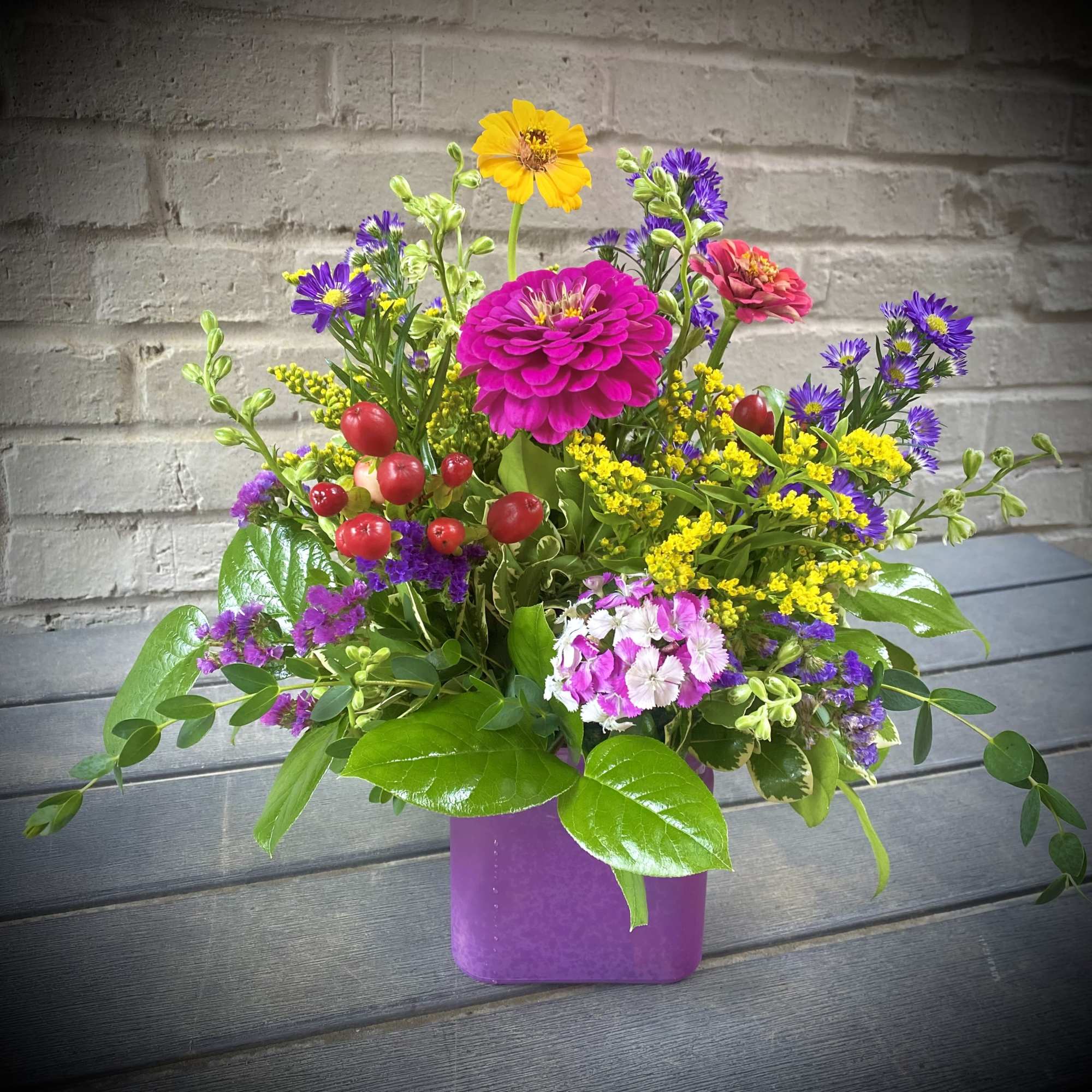 The Wildflower Wonder is a stunning design in vibrant colors. Featuring a The Wildflower Wonder is a stunning design in vibrant colors. Featuring a