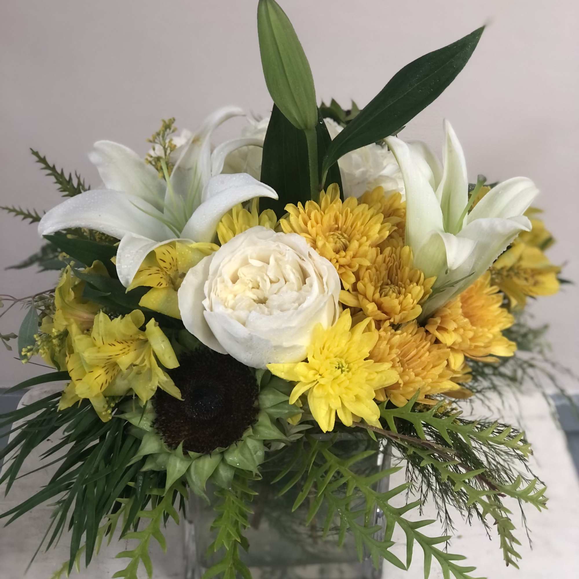 Bright, cheerful, and full of warmth &mdash; our Sunny POLA arrangement is