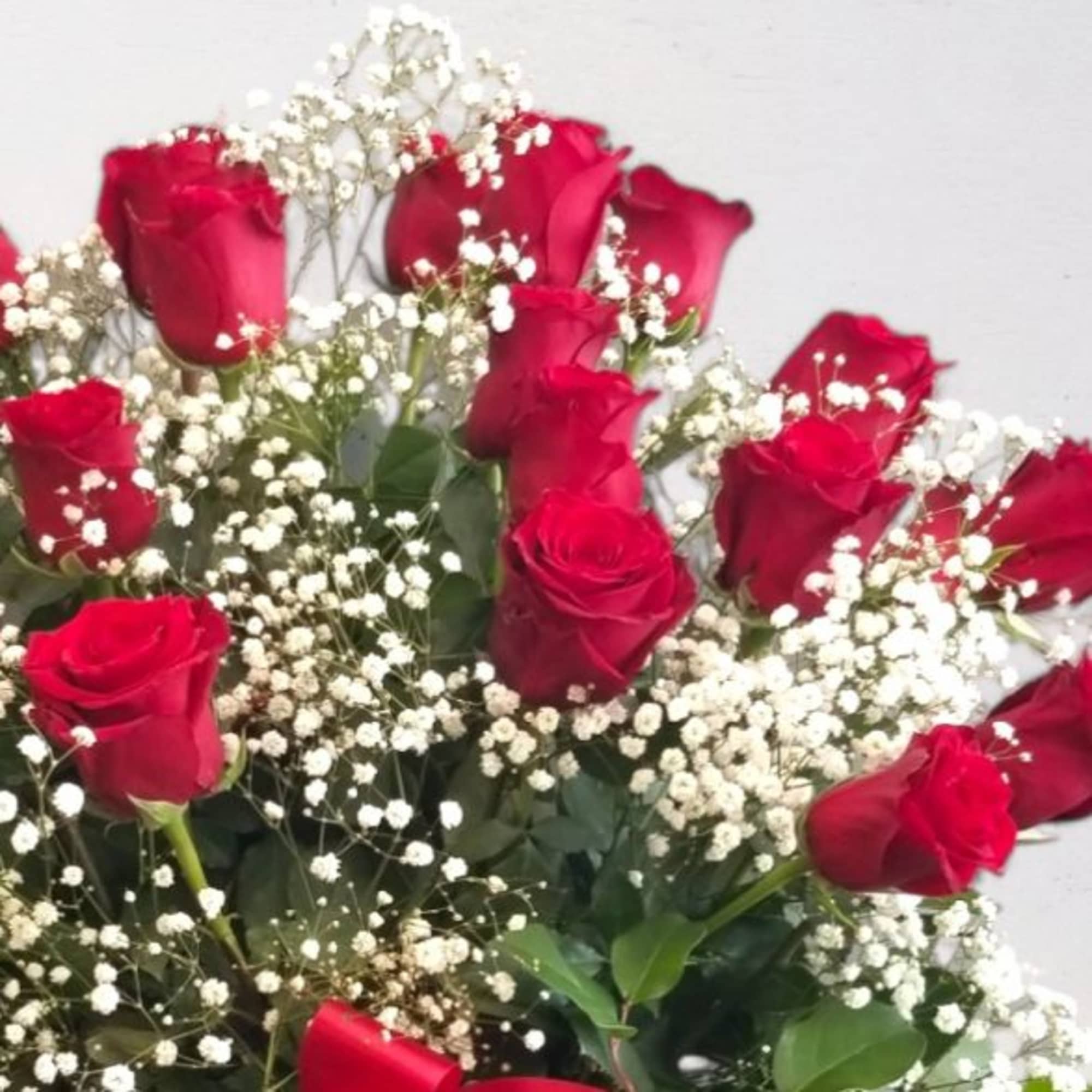 Upgrade to our Premium Classic Romance -
One (1) Dozen long stem RED