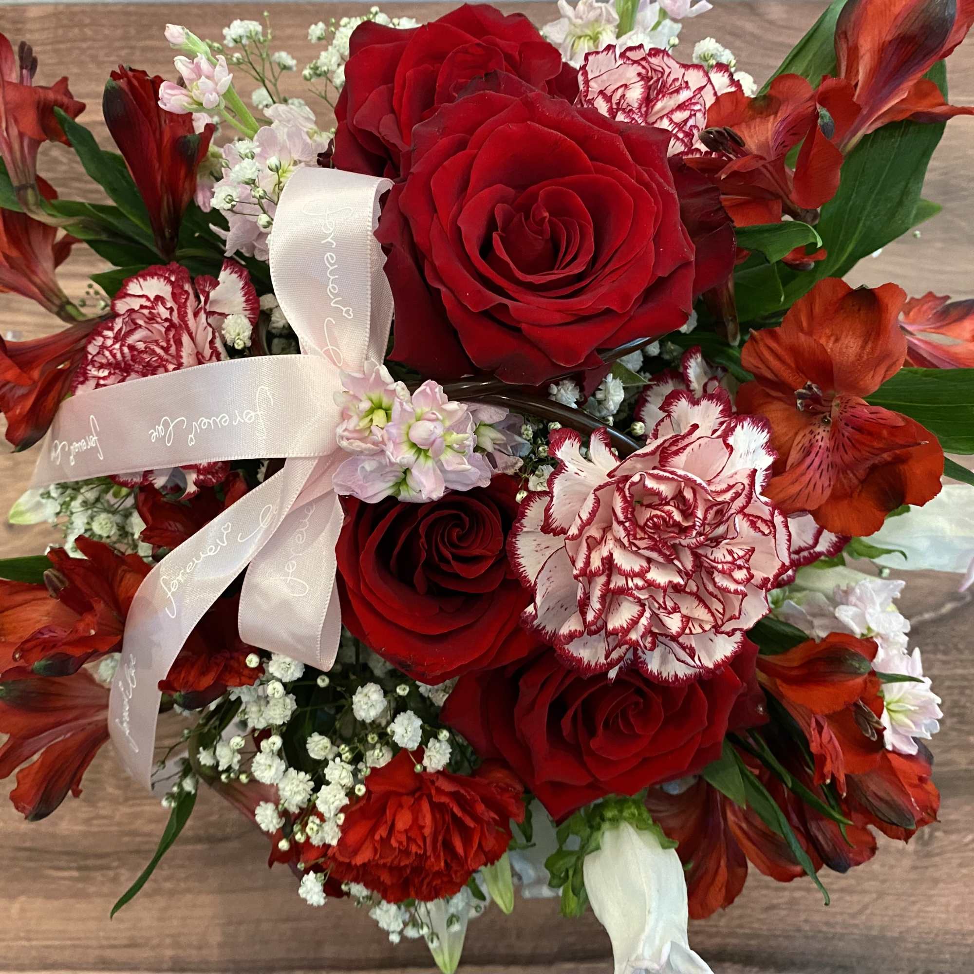 This Item Is Used Paper Basket & Flowers: Roses , Alstroemerias, Carnations This Item Is Used Paper Basket & Flowers: Roses , Alstroemerias, Carnations