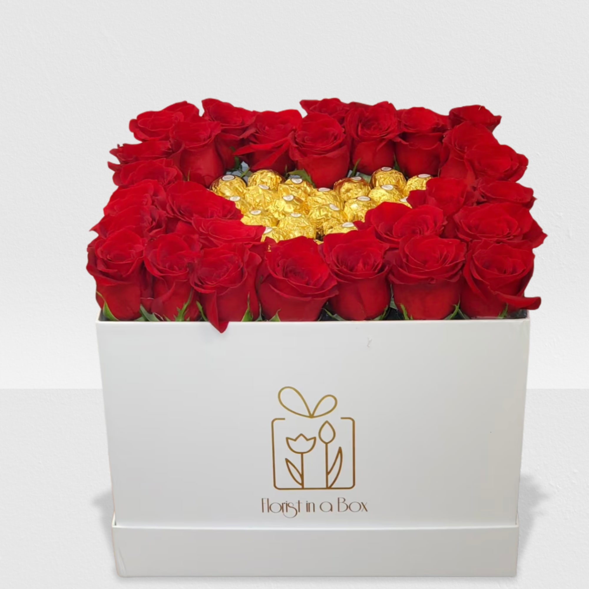 Heart of chocolates surrounded by roses in a square box 
NOTICE BOX