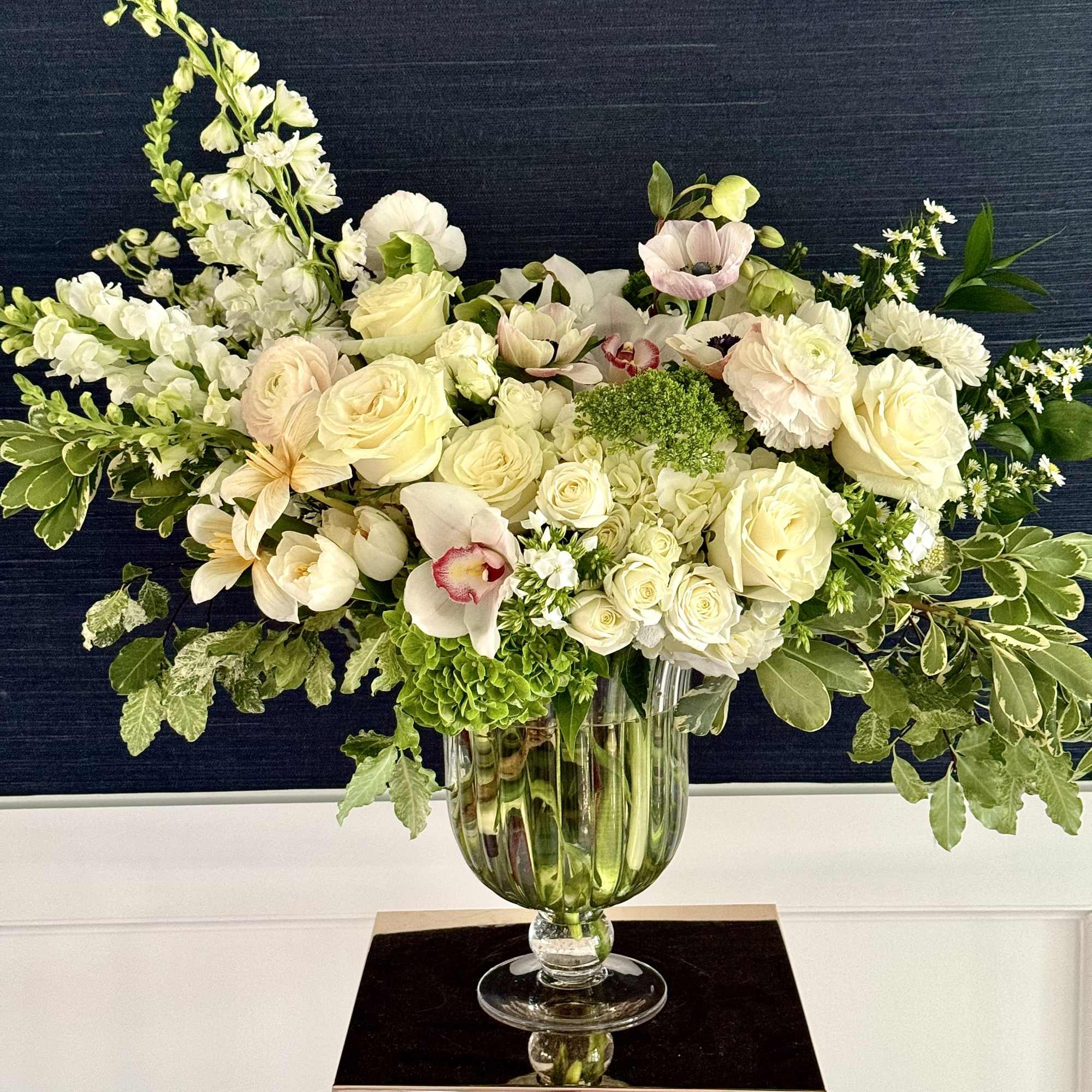 A unique floral arrangement that radiates beauty and elegance in neutral tones.