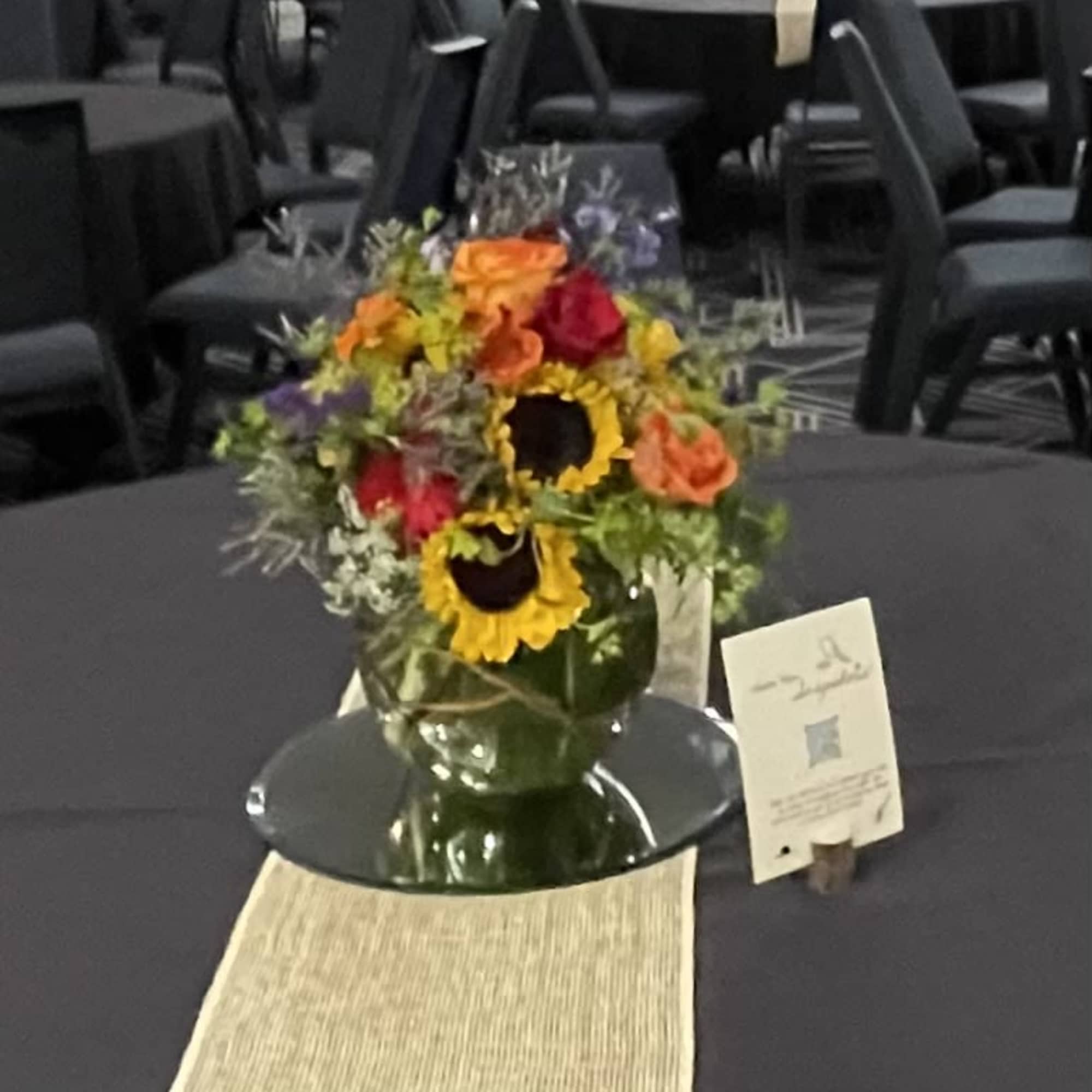 An beautiful mix of sunflowers, roses, and gerbera daisies with accent flowers An beautiful mix of sunflowers, roses, and gerbera daisies with accent flowers