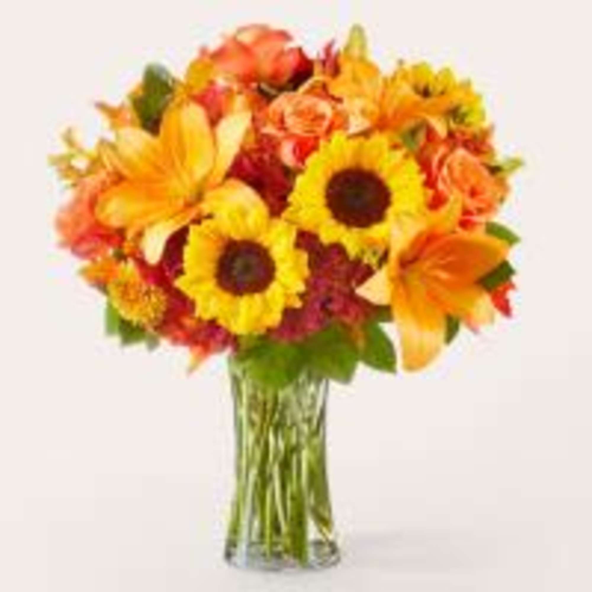 These sunny sunflowers mixed with contrasting blooms makes a beautiful, seasonal way