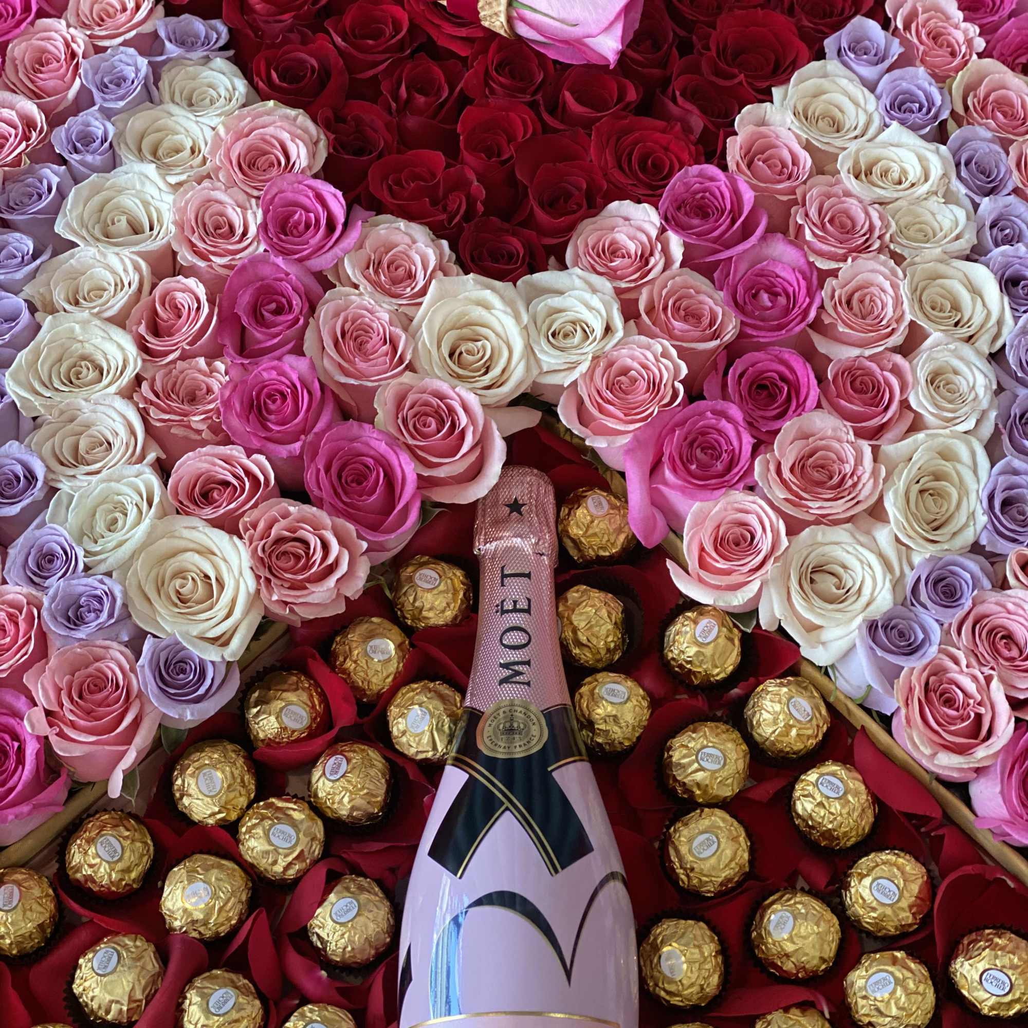 A stunning array of multi-colored roses in our largest signature box! Roses A stunning array of multi-colored roses in our largest signature box! Roses