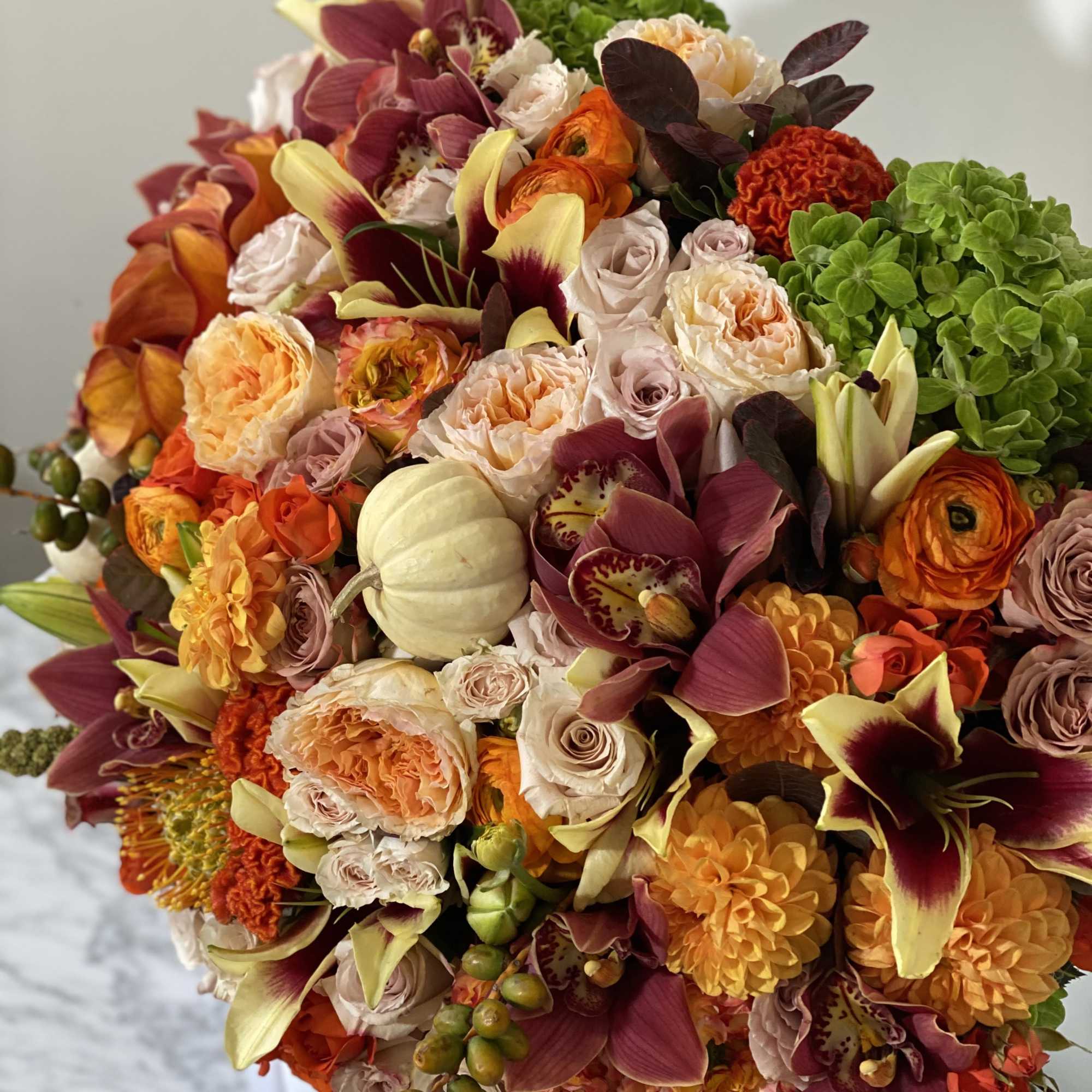 This very feminine orange and white arrangement is a must during the This very feminine orange and white arrangement is a must during the