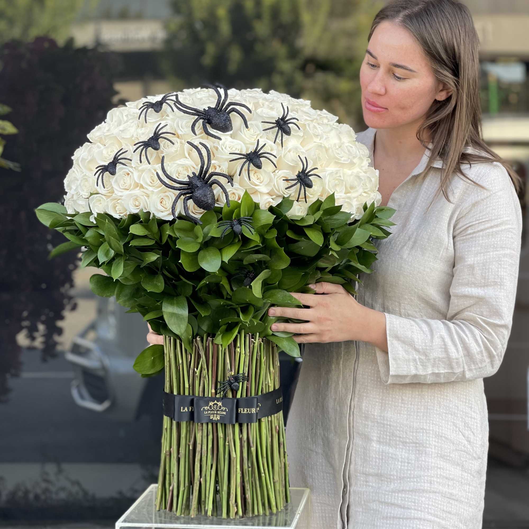 200 white roses Halloween bouquet with spiders. This bouquet doesn’t require a 200 white roses Halloween bouquet with spiders. This bouquet doesn’t require a