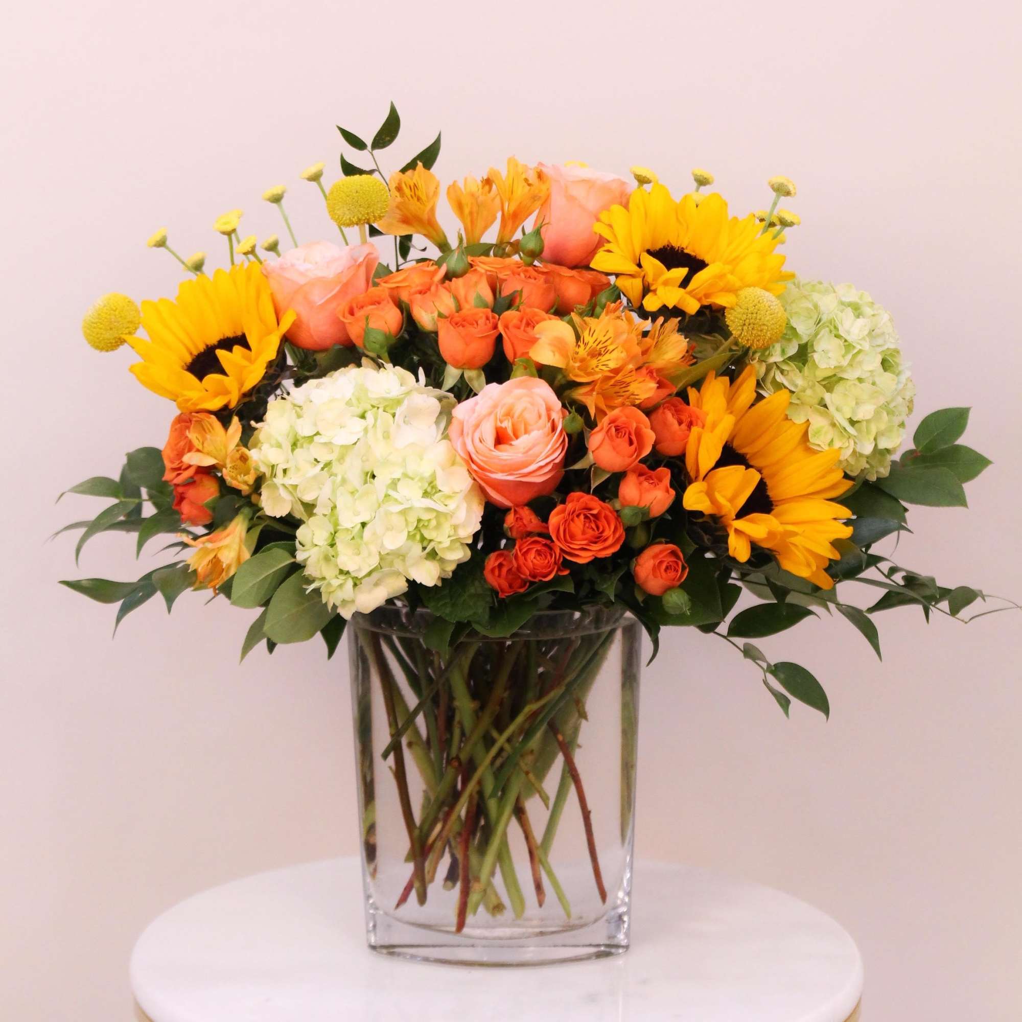 Sunny shades of yellow mixed with orange and green will delight your