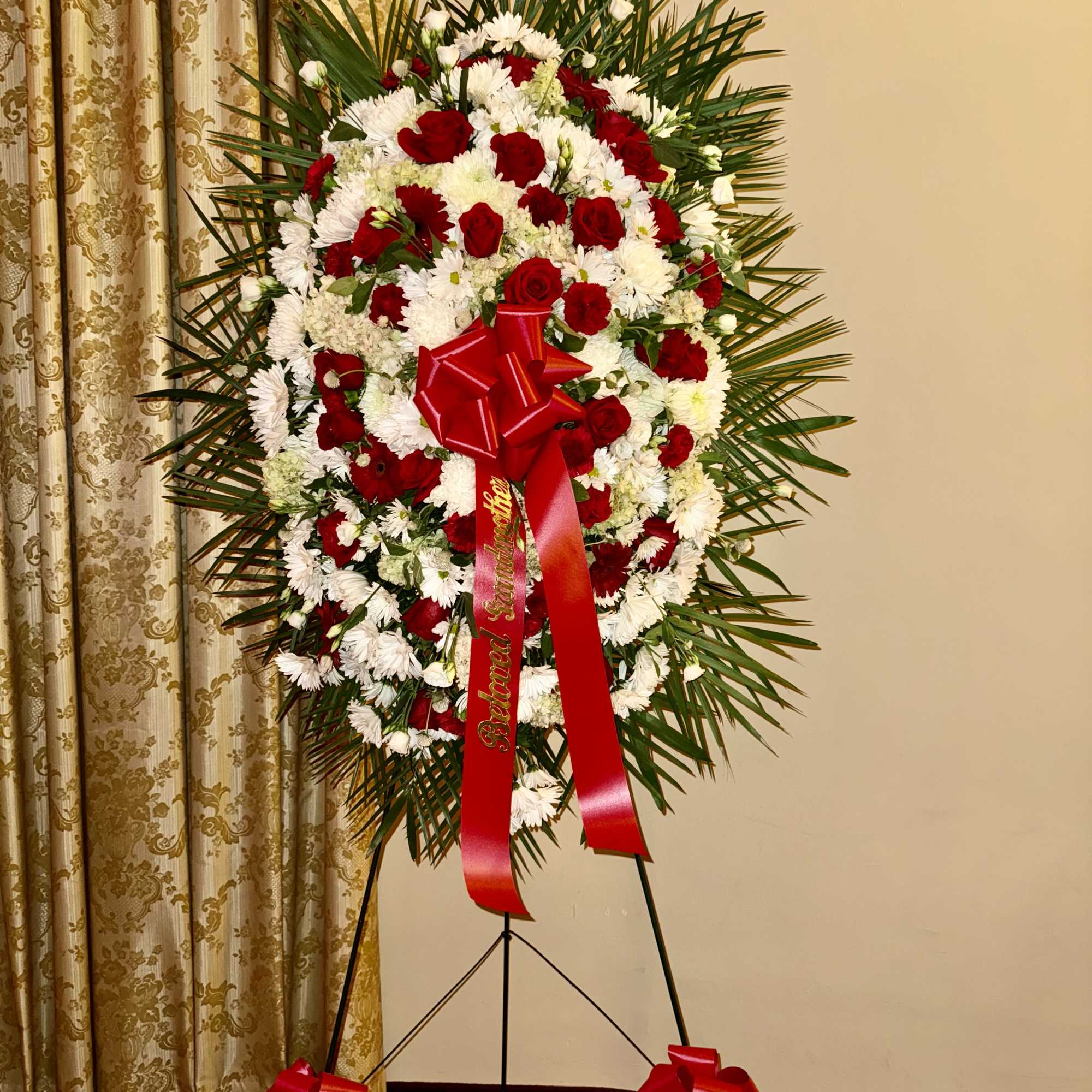 A dignified tribute of love and remembrance, this standing spray blends the