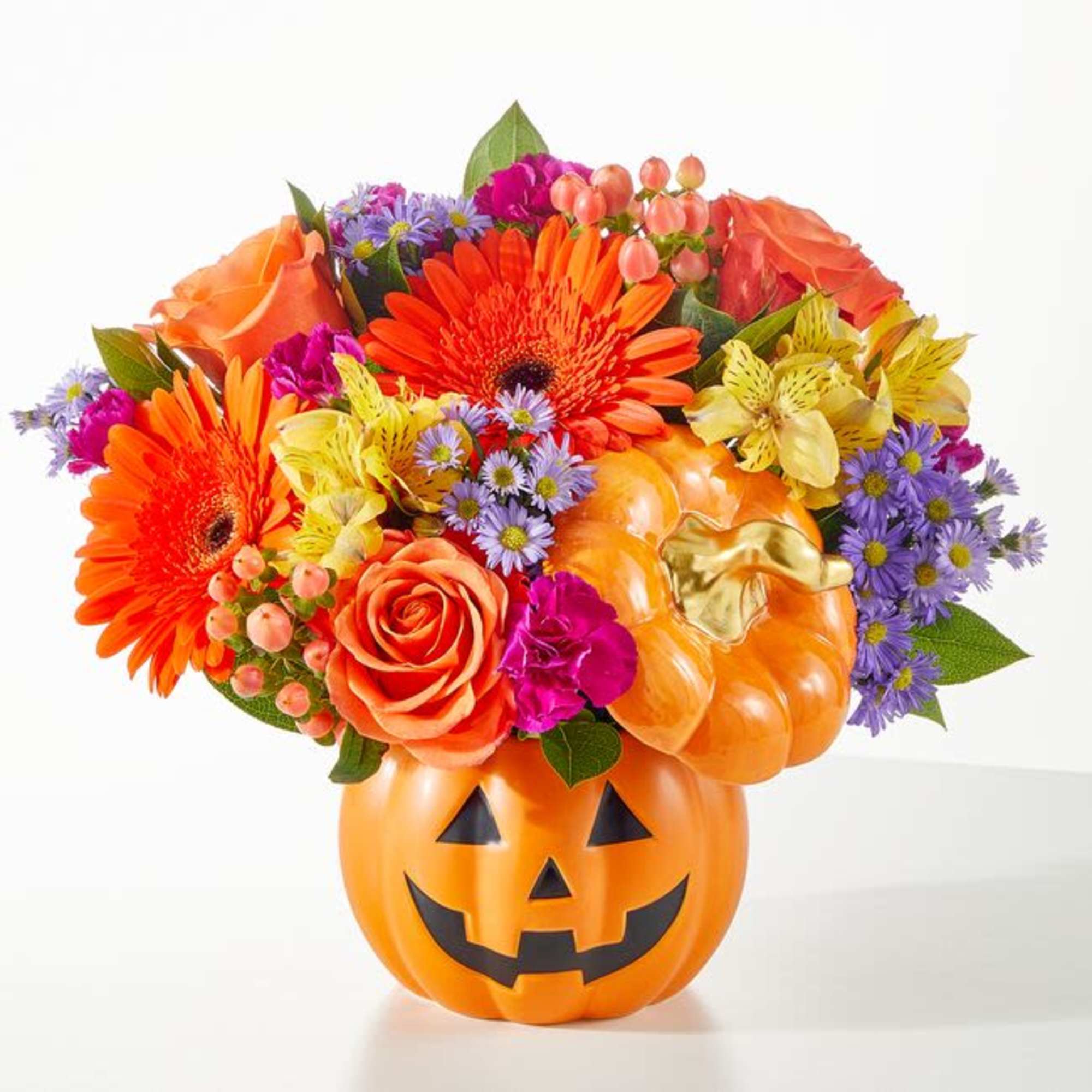 This festive ceramic Jack-o-lantern arrives with a colorful fall mix sure to This festive ceramic Jack-o-lantern arrives with a colorful fall mix sure to