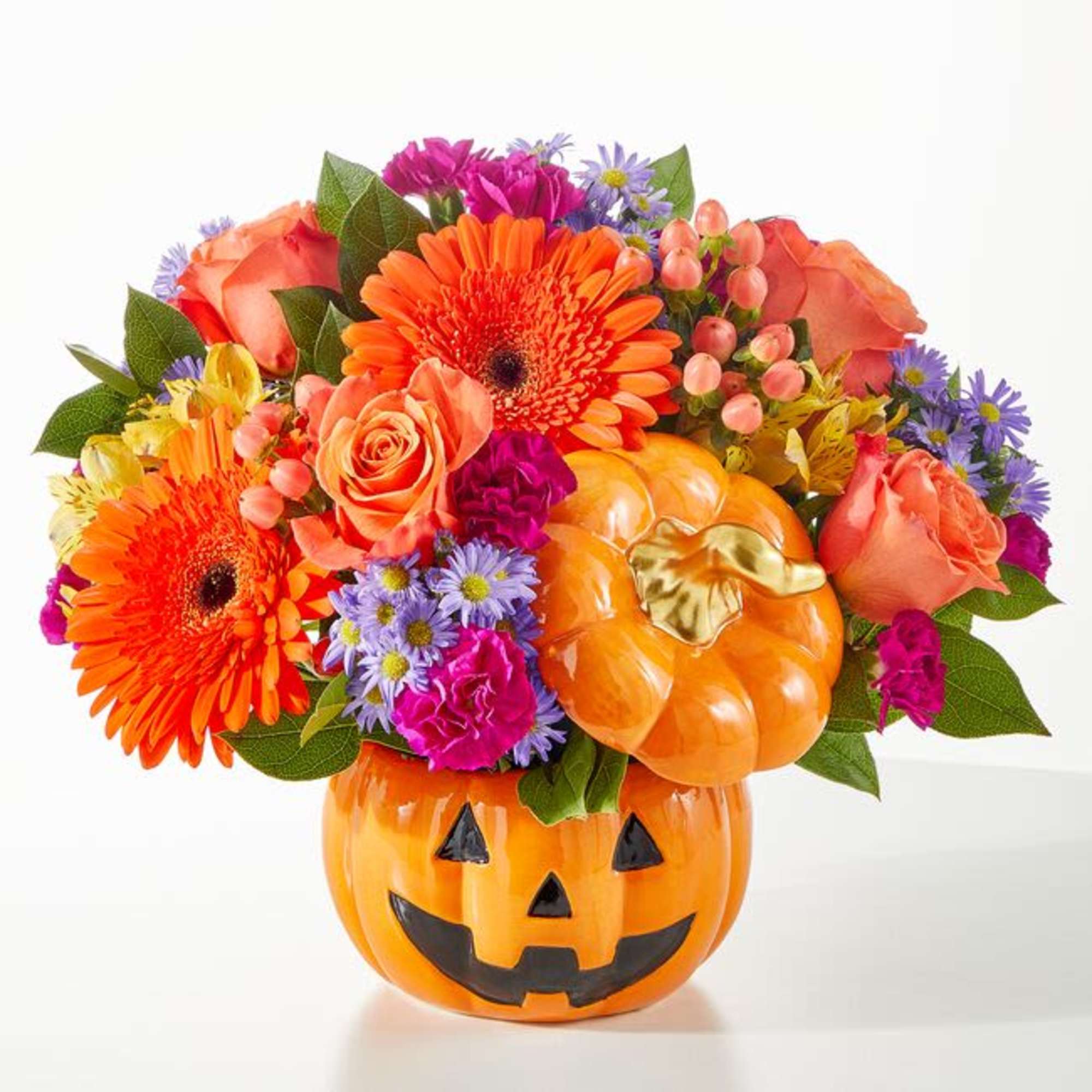 This festive ceramic Jack-o-lantern arrives with a colorful fall mix sure to This festive ceramic Jack-o-lantern arrives with a colorful fall mix sure to